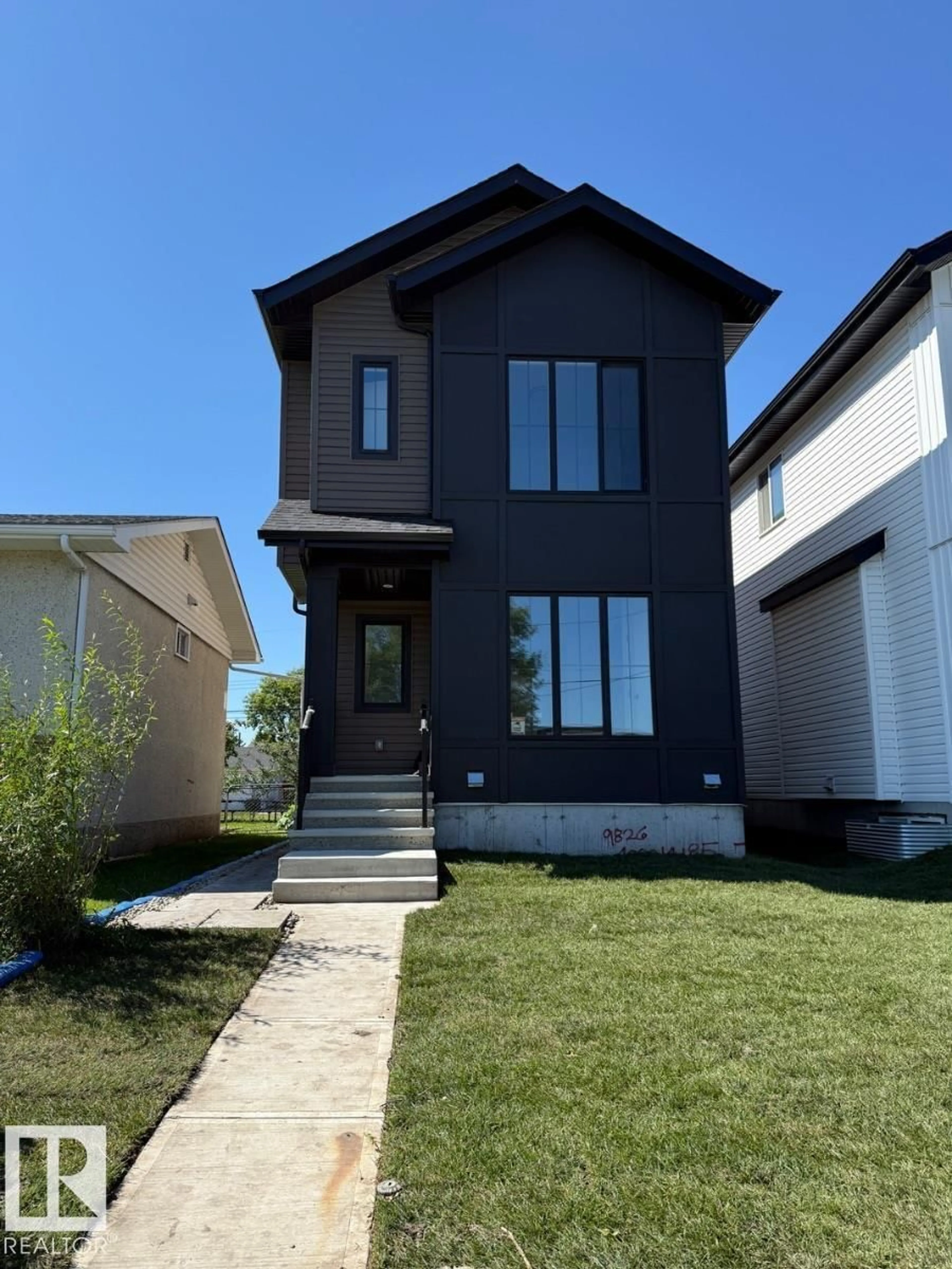 Home with vinyl exterior material, street for NW - 9826 158 ST, Edmonton Alberta T5P2X3
