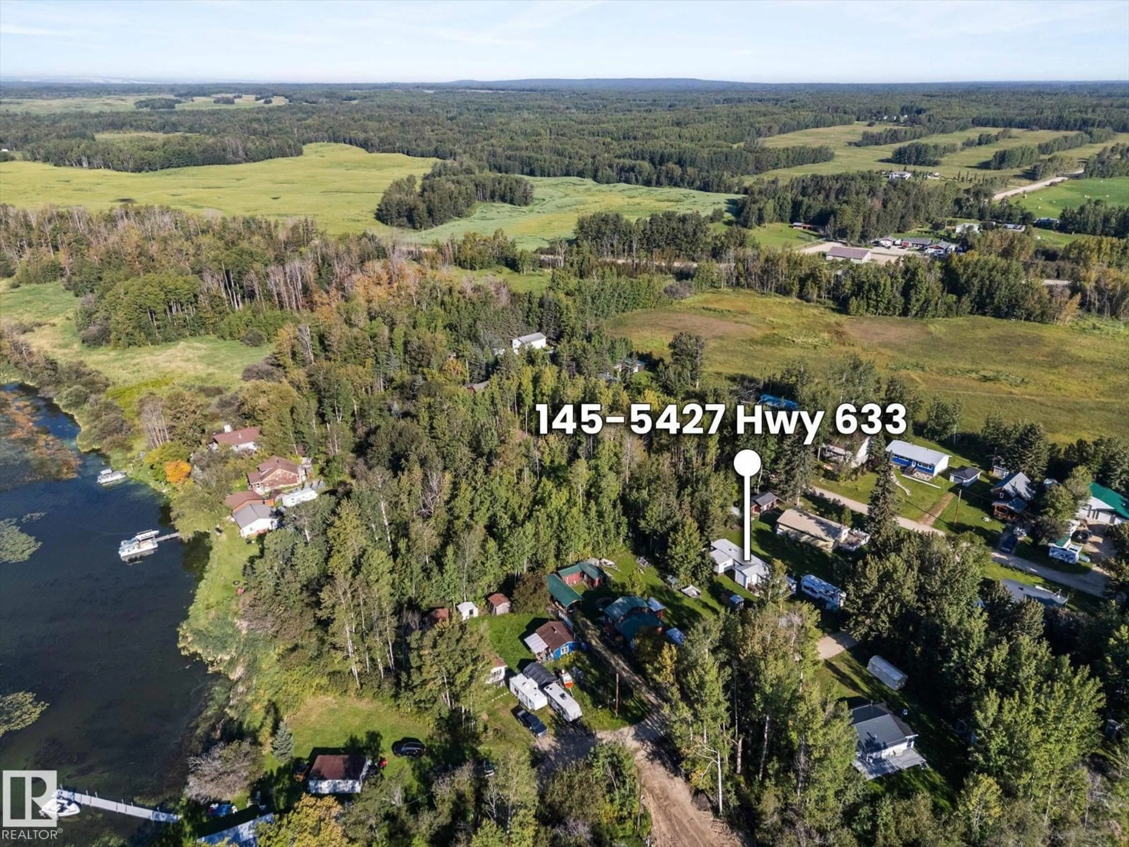 A pic from outside/outdoor area/front of a property/back of a property/a pic from drone, water/lake/river/ocean view for #147 - 5427 HWY 633, Rural Lac Ste. Anne County Alberta T0E1M0