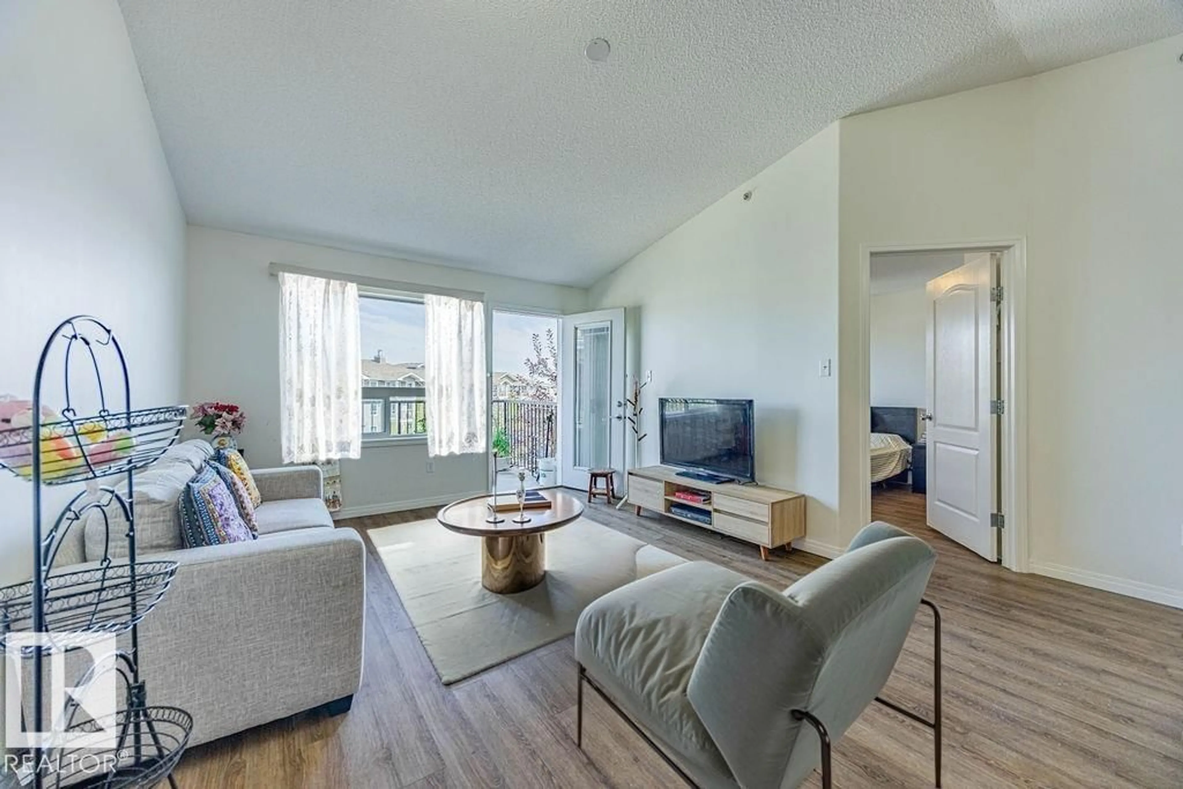 Living room with furniture, unknown for 1401 - 9363 SIMPSON DR, Edmonton Alberta T6R0N2
