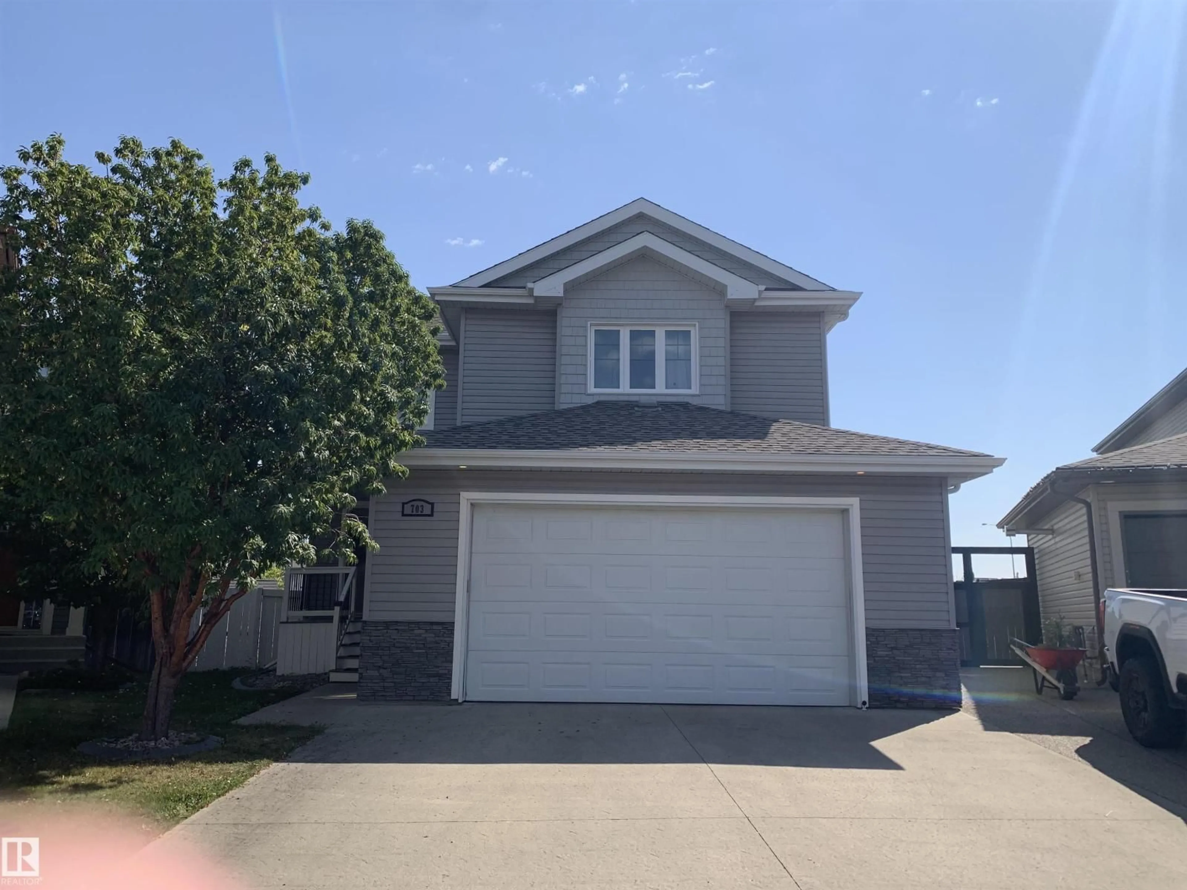 Home with vinyl exterior material, street for 703 SUNCREST, Sherwood Park Alberta T8H0G6