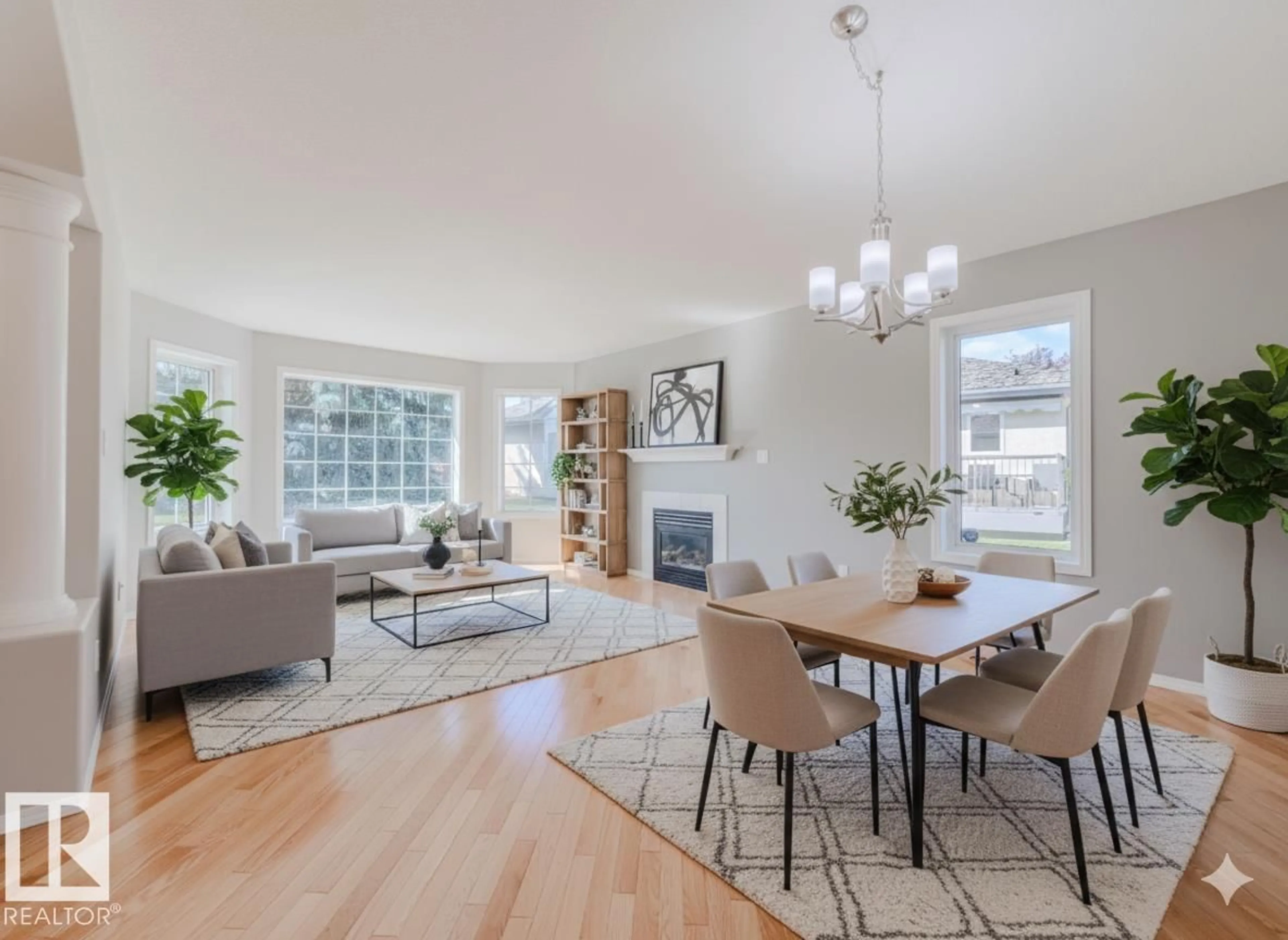 Living room with furniture, wood/laminate floor for 215 - 124 BLACKBURN E, Edmonton Alberta T6W1B9
