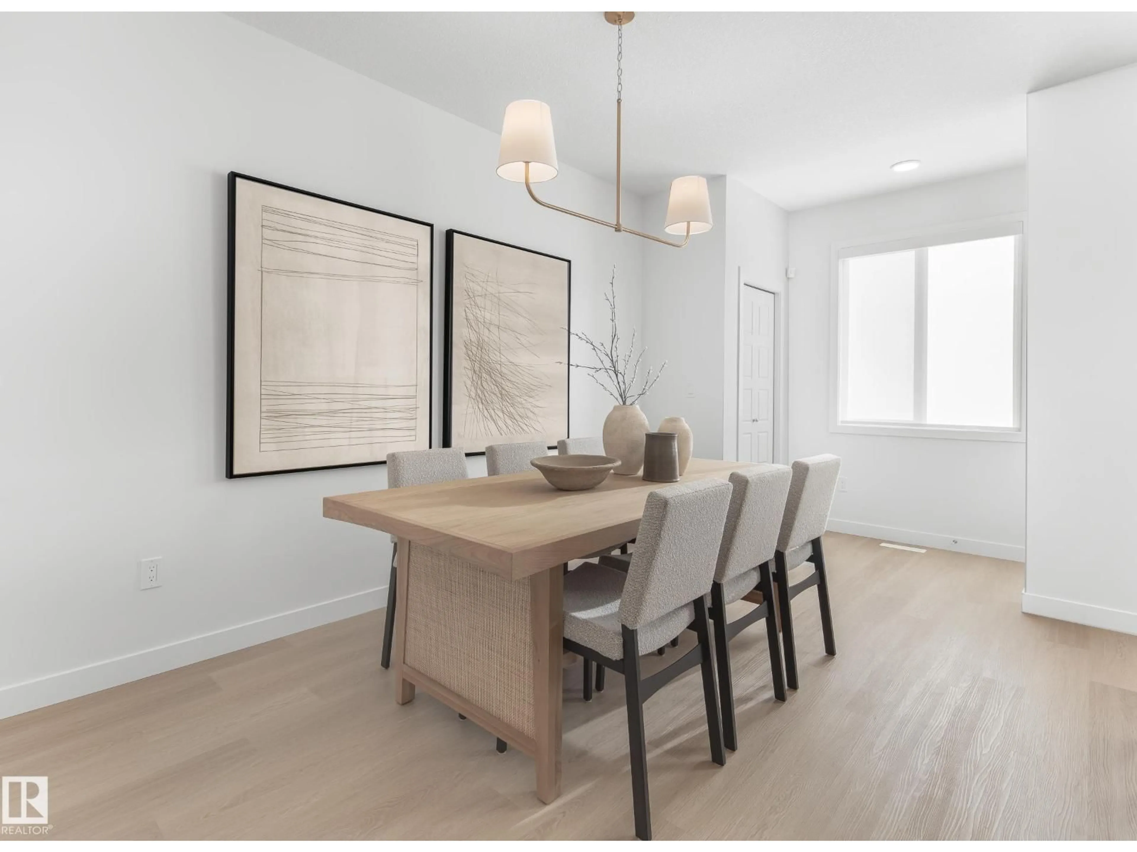 Dining room, wood/laminate floor for 2222 MUCKLEPLUM CR, Edmonton Alberta T6X3G7