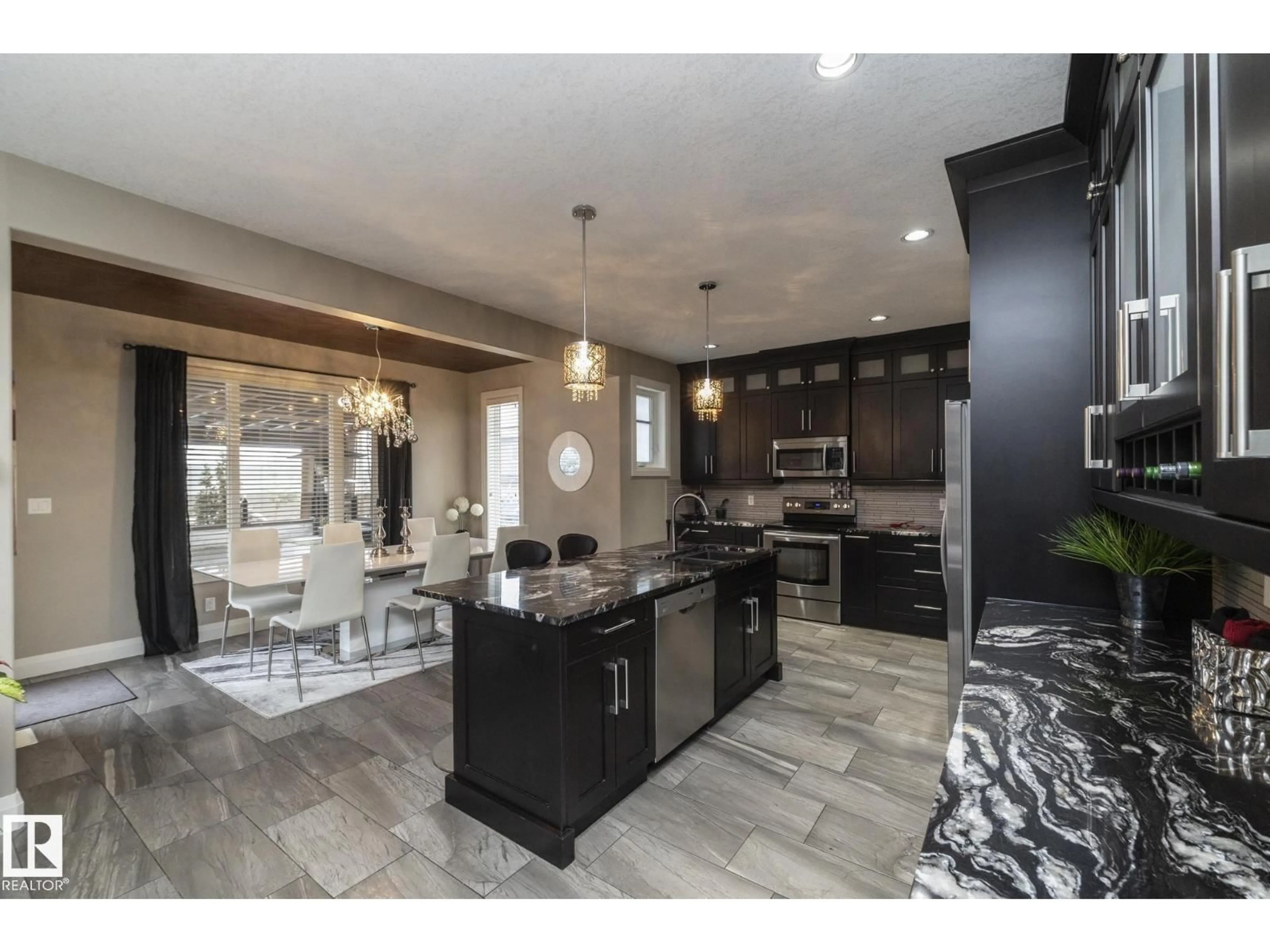 Open concept kitchen, ceramic/tile floor for 2252 CAMERON RAVINE CO, Edmonton Alberta T6M0L9