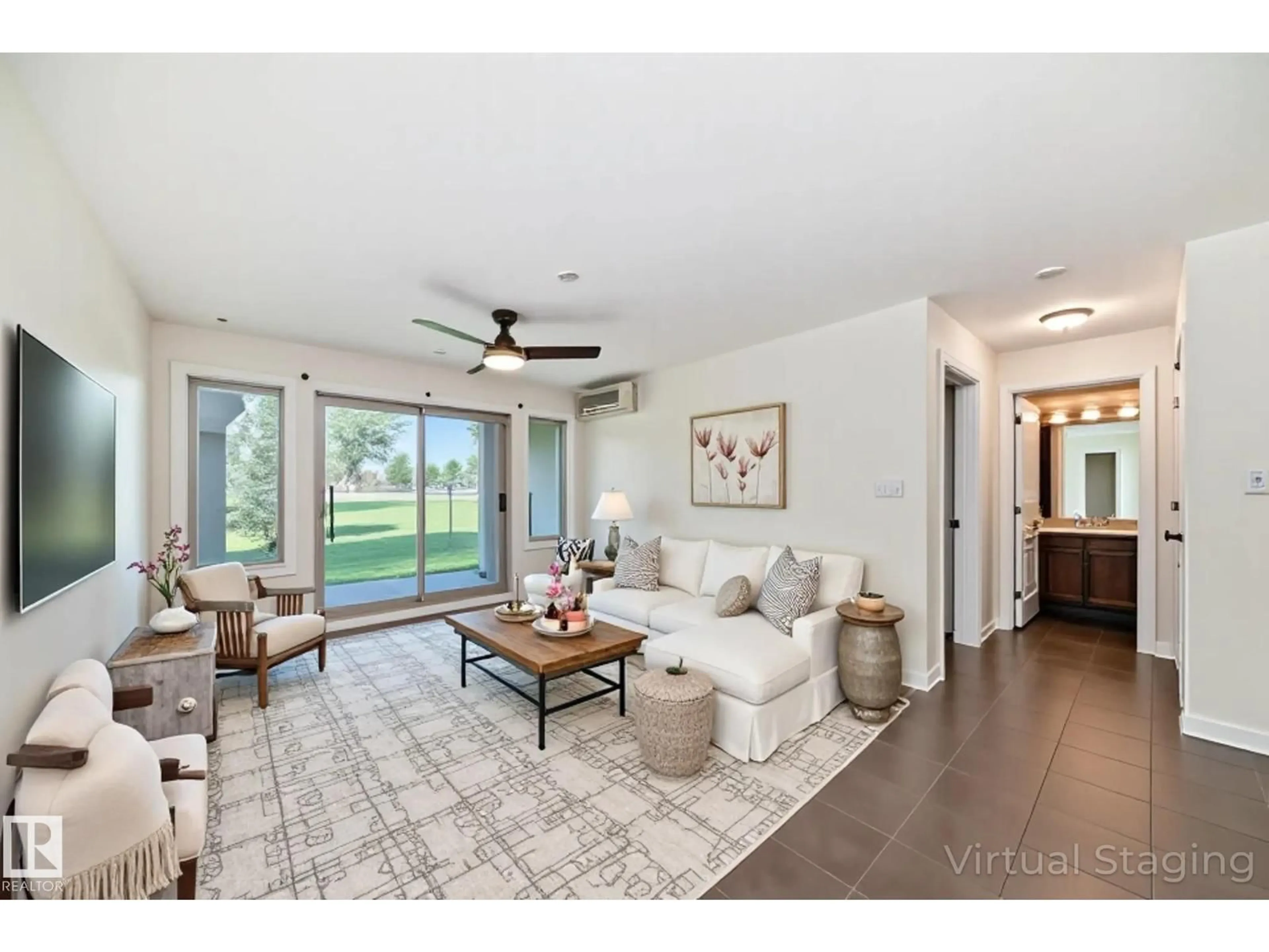 Living room with furniture, ceramic/tile floor for 278 - 125 SUDER GREENS DR, Edmonton Alberta T5T6V6