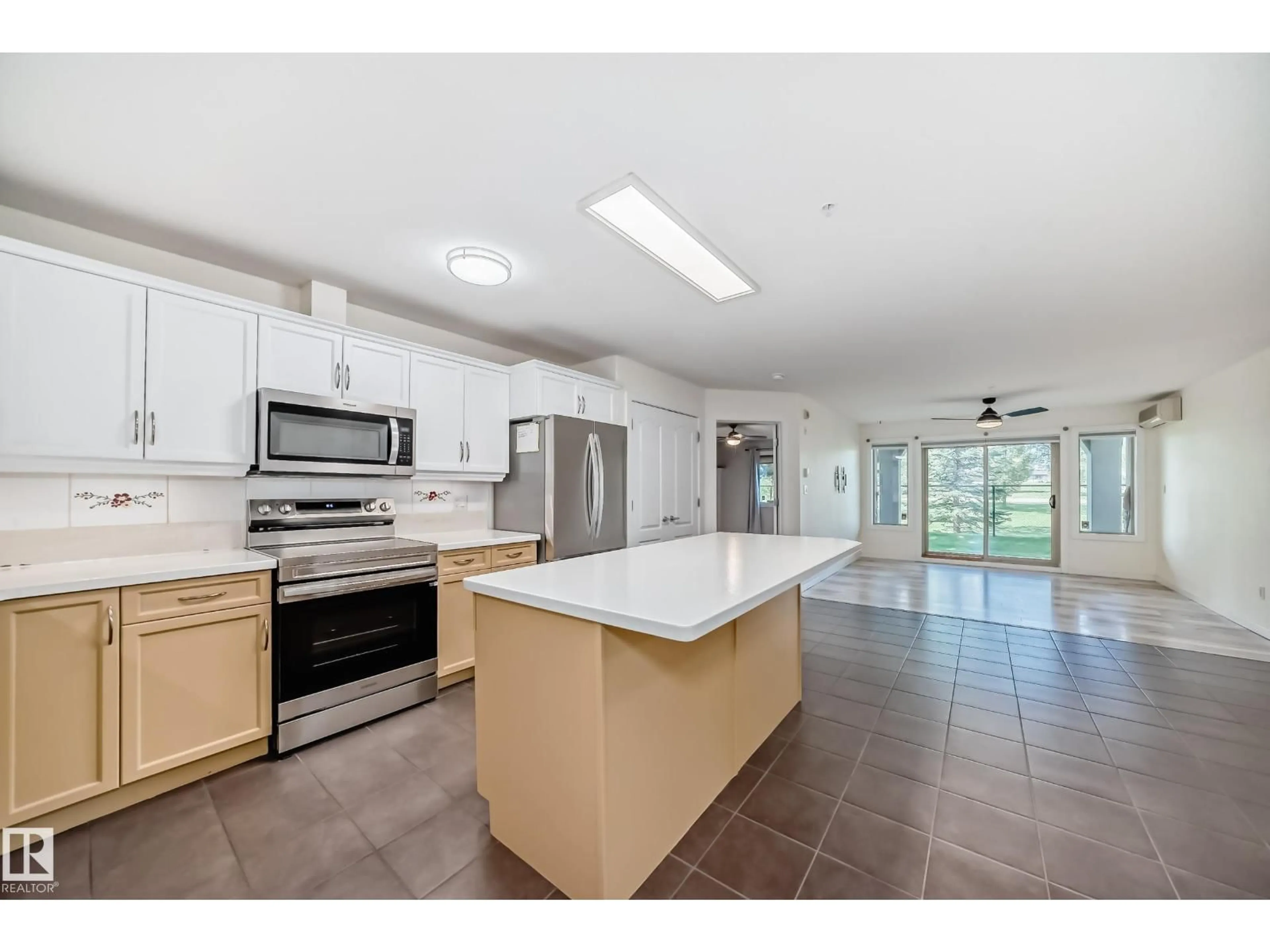 Open concept kitchen, ceramic/tile floor for 278 - 125 SUDER GREENS DR, Edmonton Alberta T5T6V6