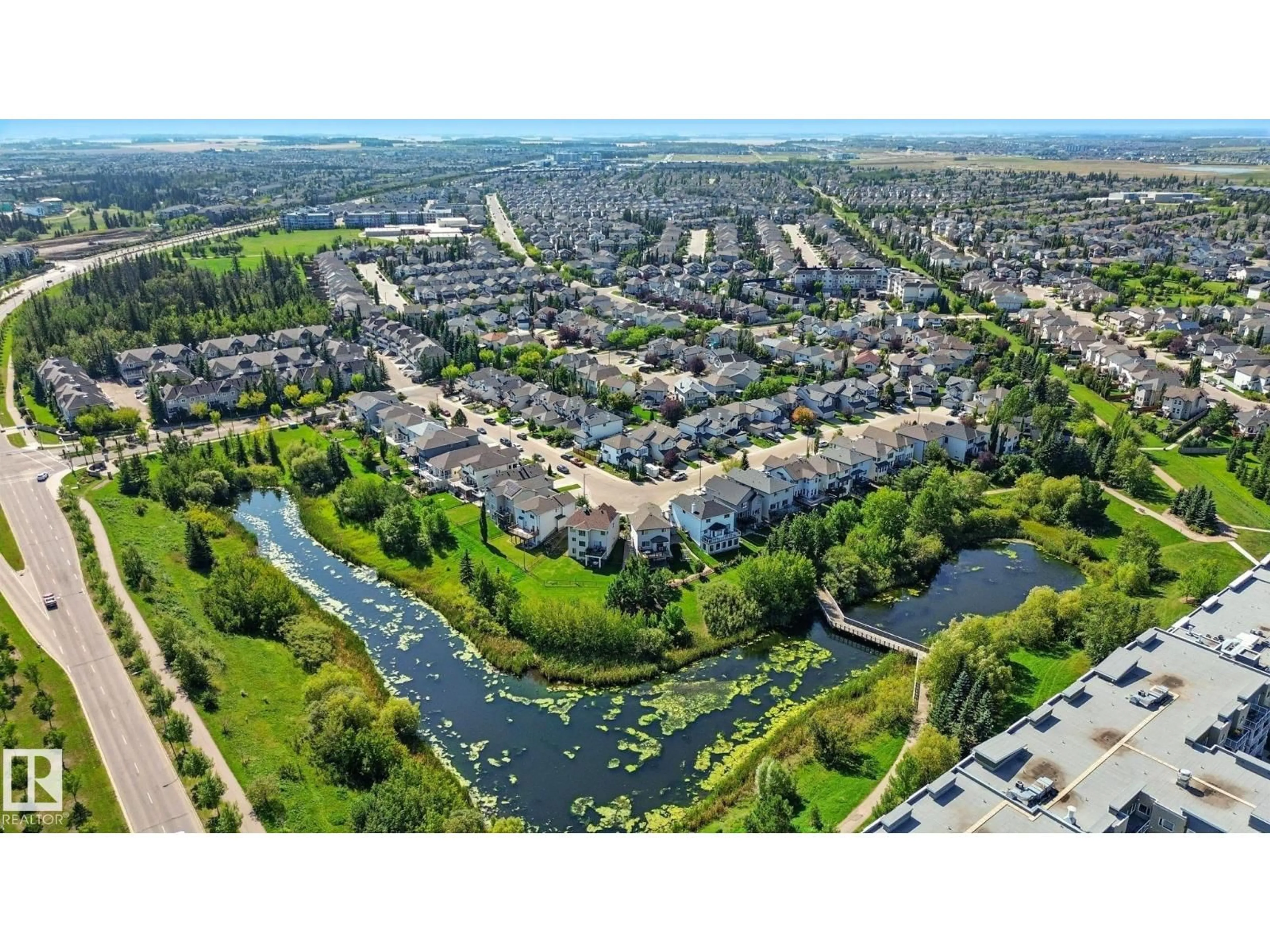 A pic from outside/outdoor area/front of a property/back of a property/a pic from drone, water/lake/river/ocean view for #213 - 11449 ELLERSLIE RD, Edmonton Alberta T6W1T2