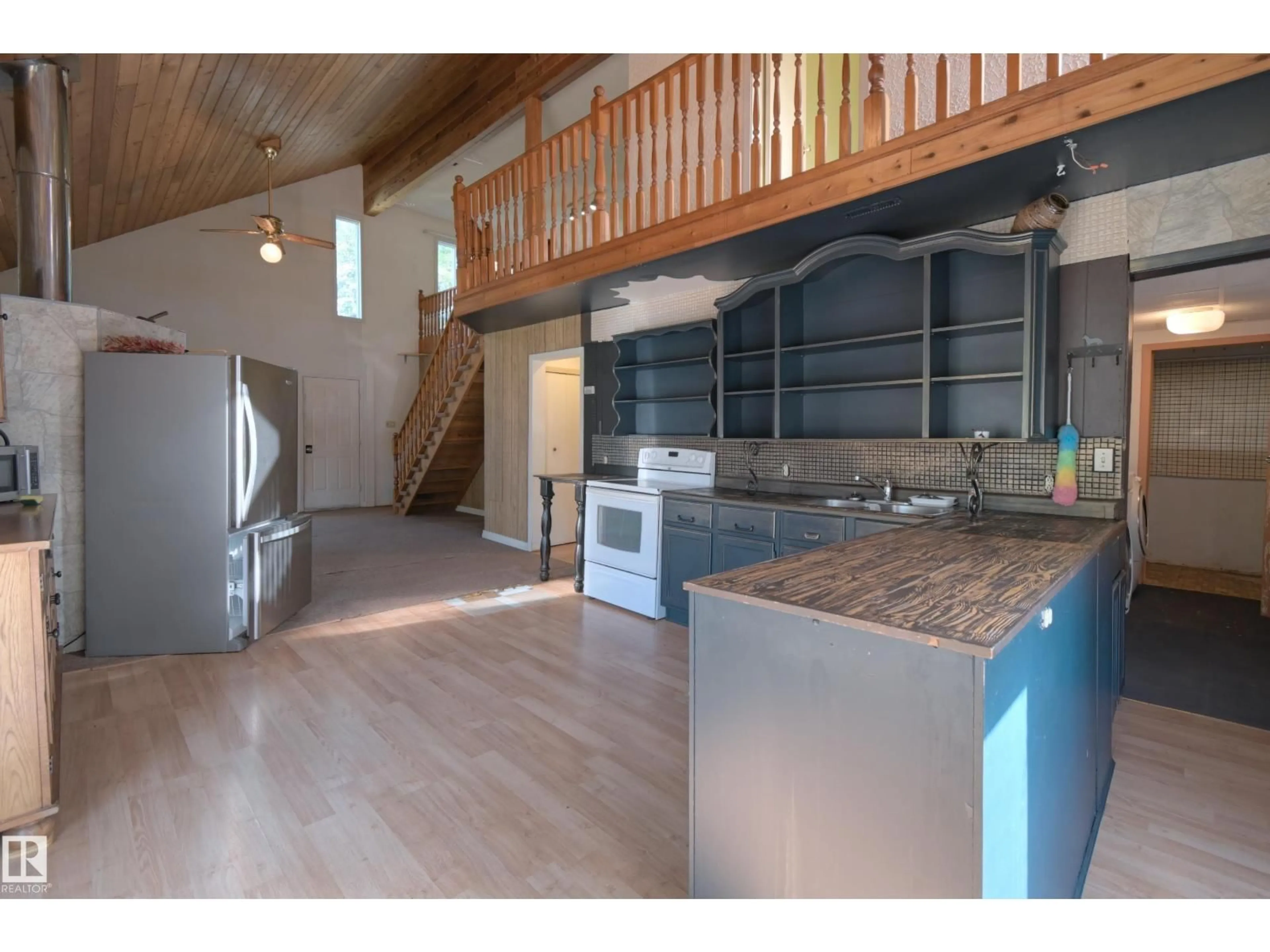 Open concept kitchen, wood/laminate floor for 5912 49 AV, Rural Lac Ste. Anne County Alberta T0E0A0