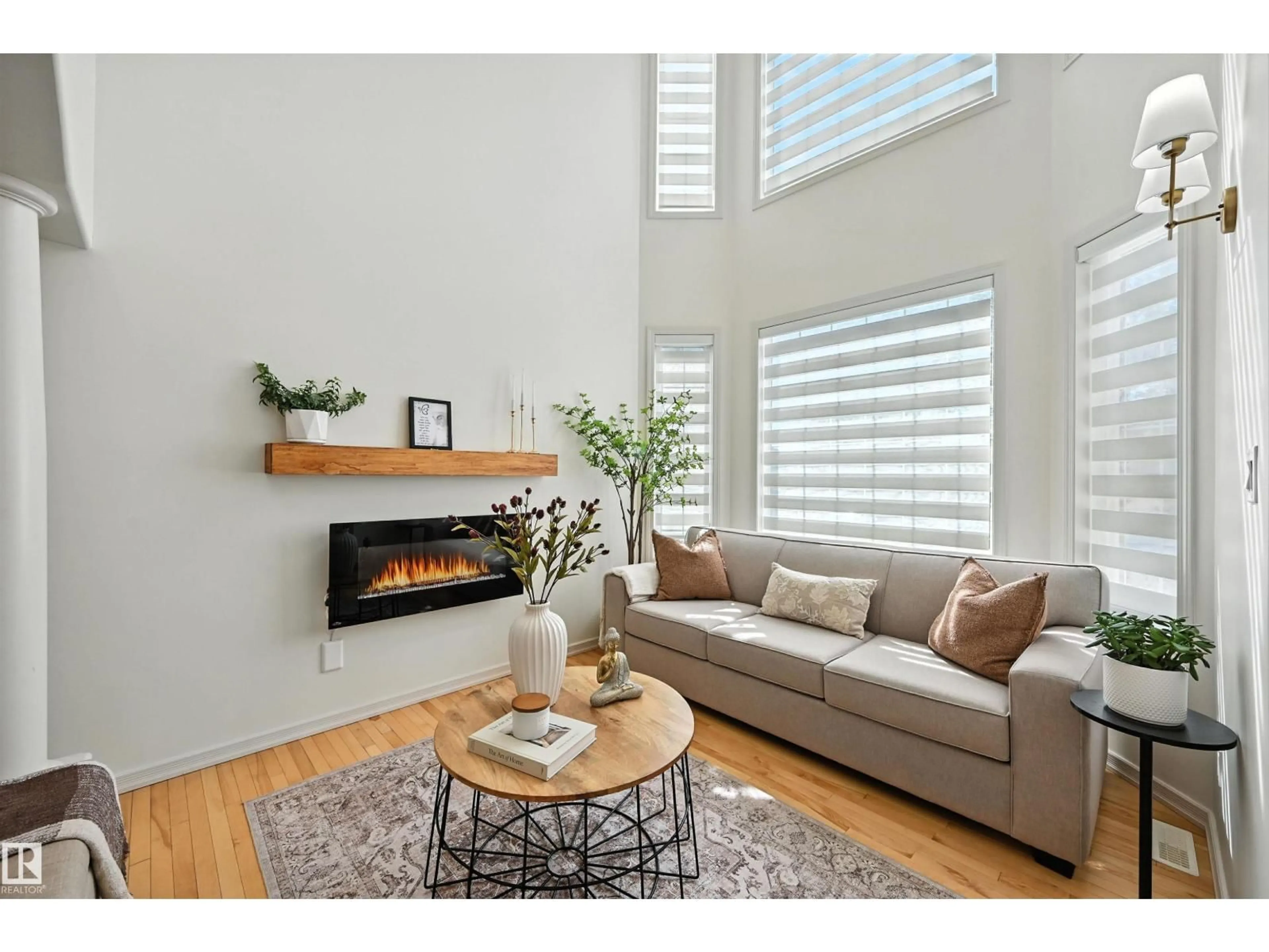 Living room with furniture, wood/laminate floor for NW - 2915 TREDGER GREEN GR, Edmonton Alberta T6R3R7