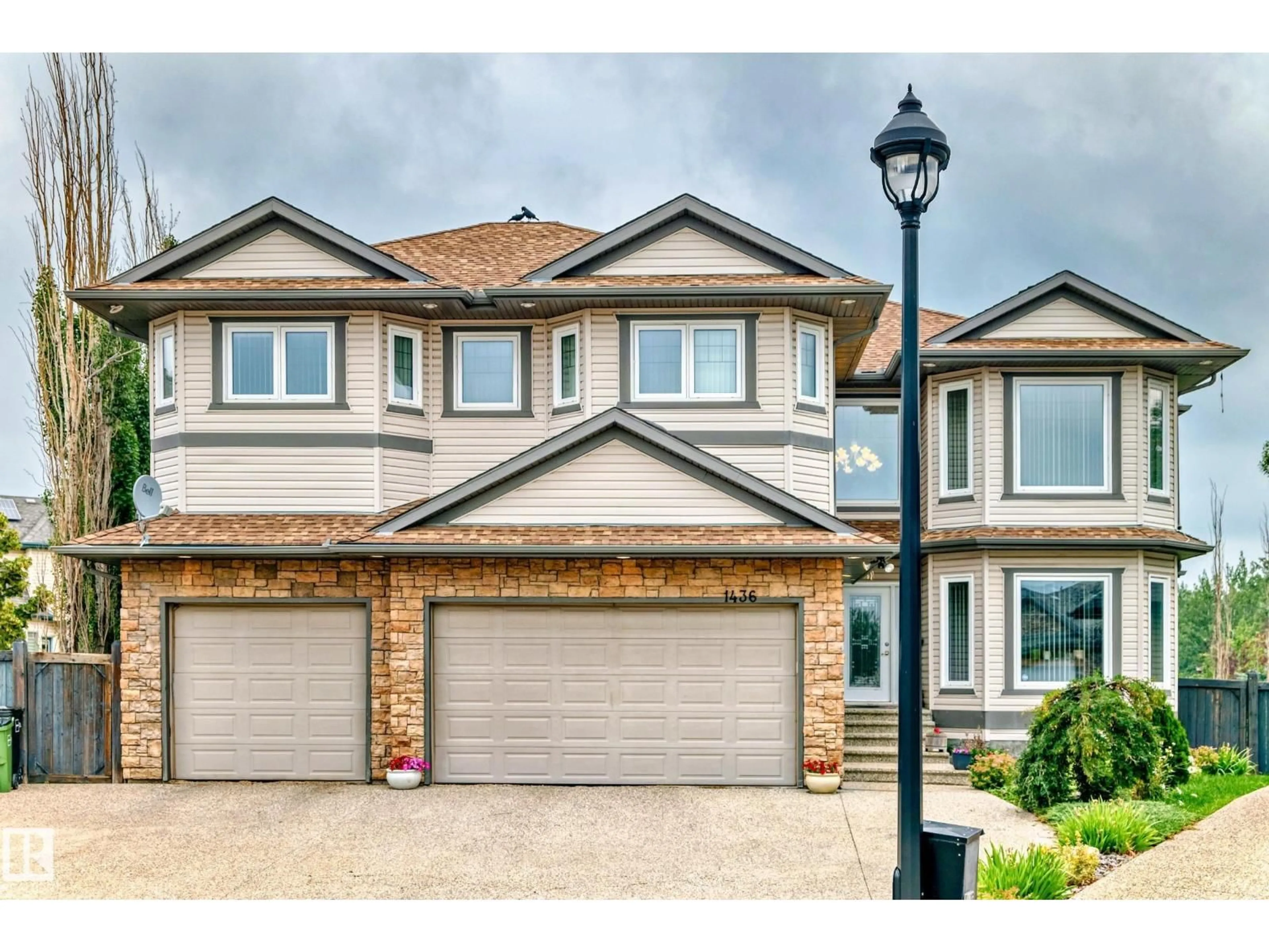Home with vinyl exterior material, street for 1436 BISHOP PT, Edmonton Alberta T6W1H3
