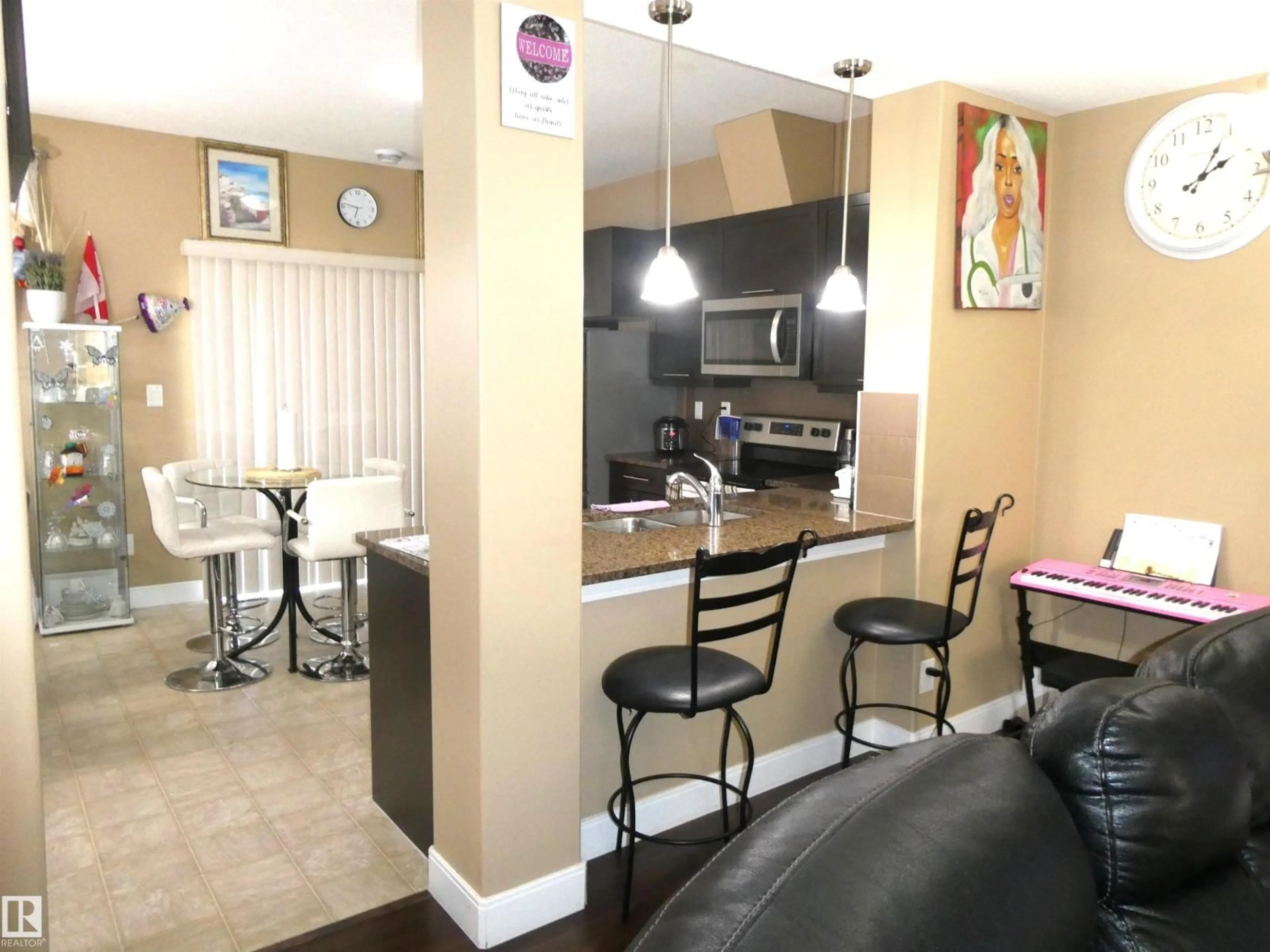 Open concept kitchen, unknown for #40 - 13003 132 AV, Edmonton Alberta T5L3R2