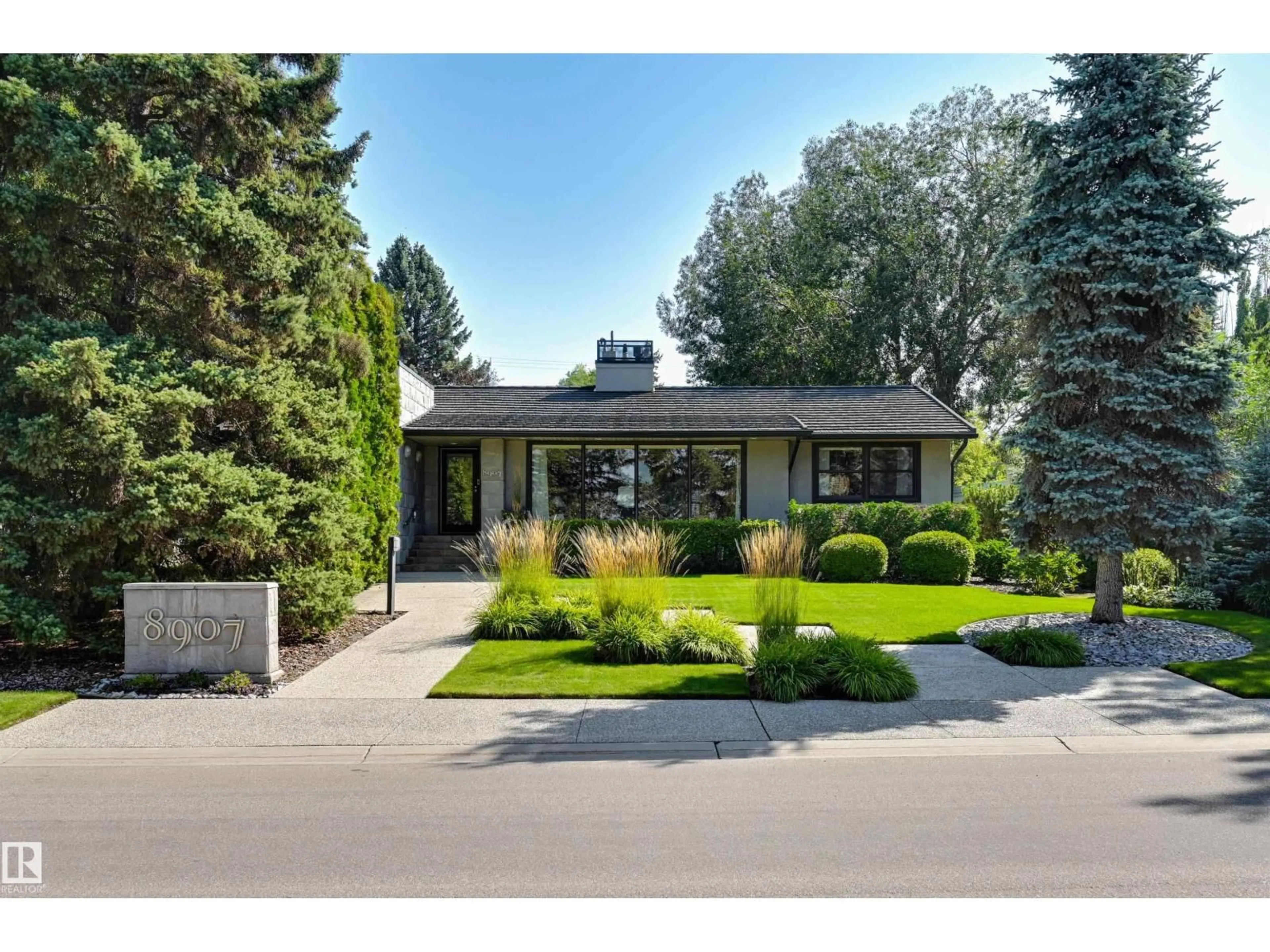 Home with brick exterior material, street for 8907 SASKATCHEWAN DR, Edmonton Alberta T6G2B1