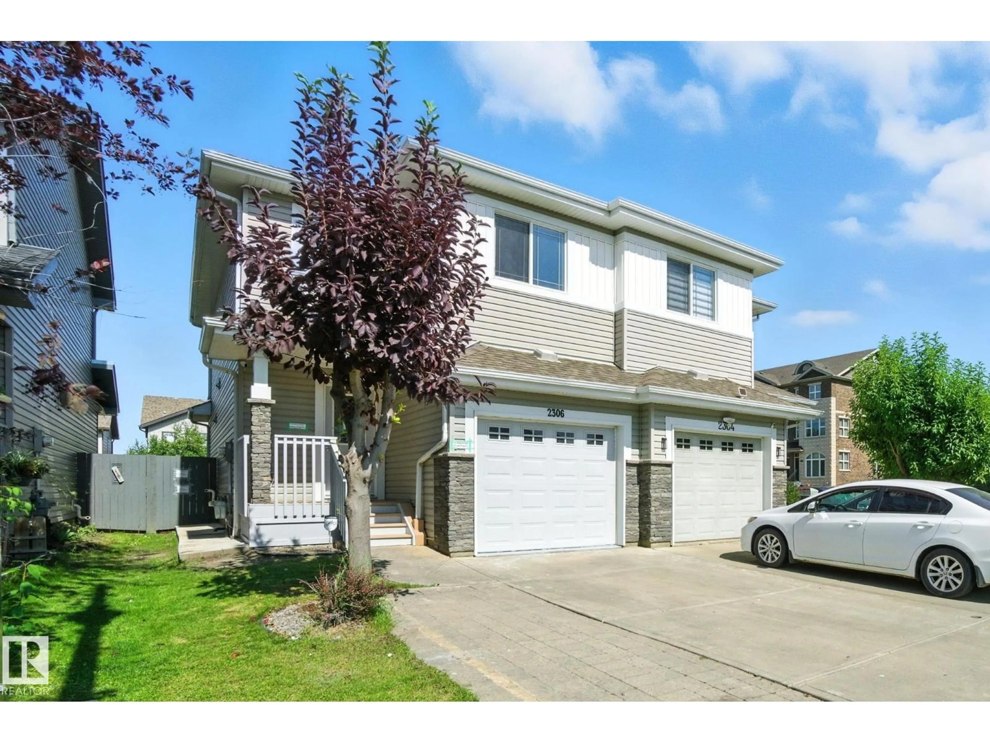Home with vinyl exterior material, street for 2306 CASSELMAN CR, Edmonton Alberta T6W0W1