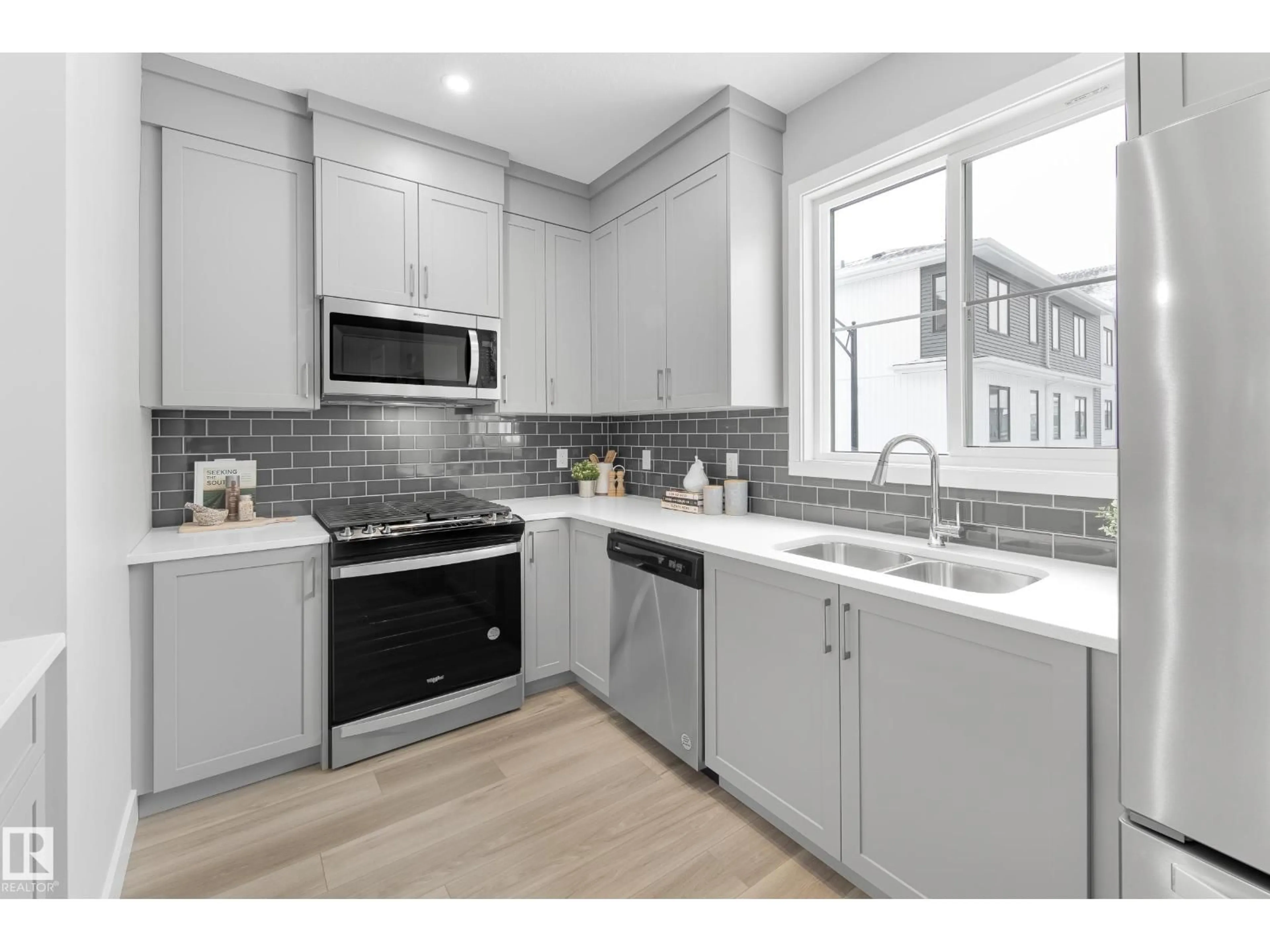 Open concept kitchen, ceramic/tile floor for #6 - 6905 25 AV, Edmonton Alberta T6X3B7