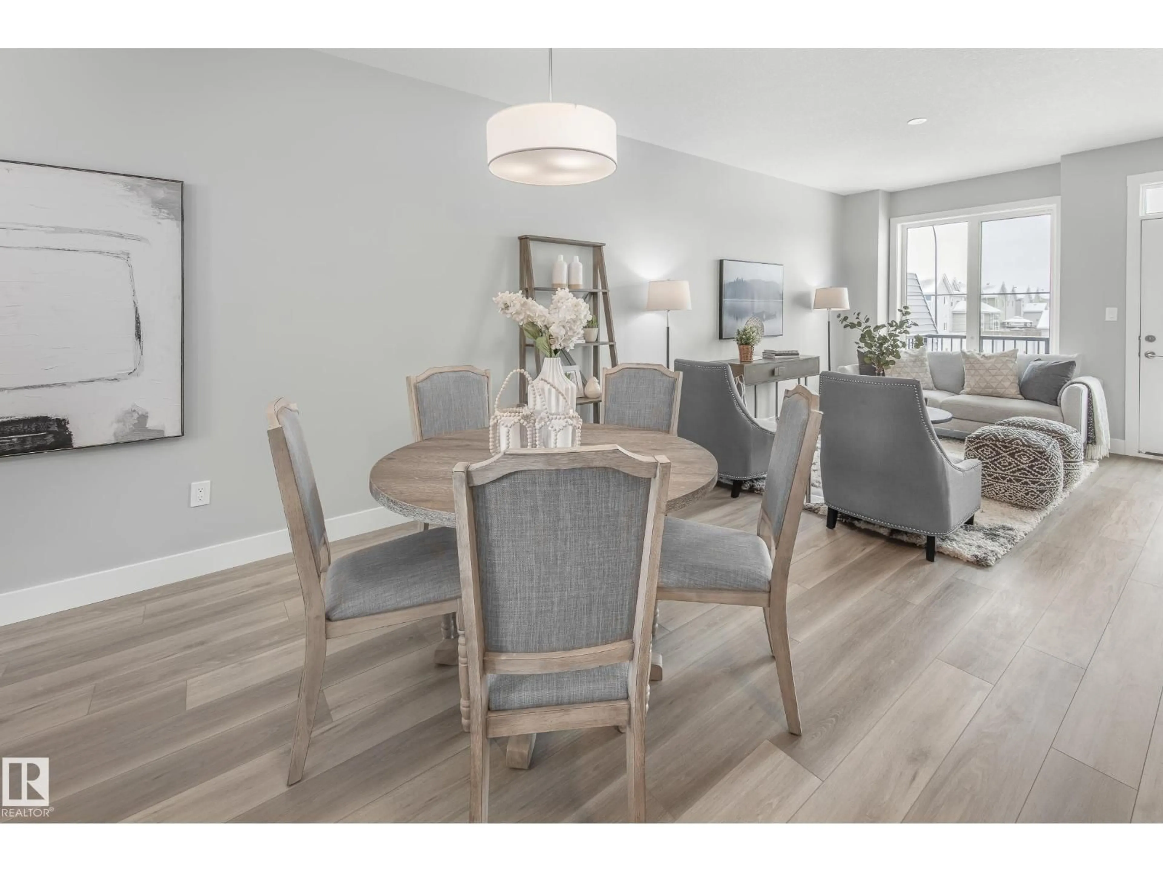 Dining room, wood/laminate floor for #6 - 6905 25 AV, Edmonton Alberta T6X3B7