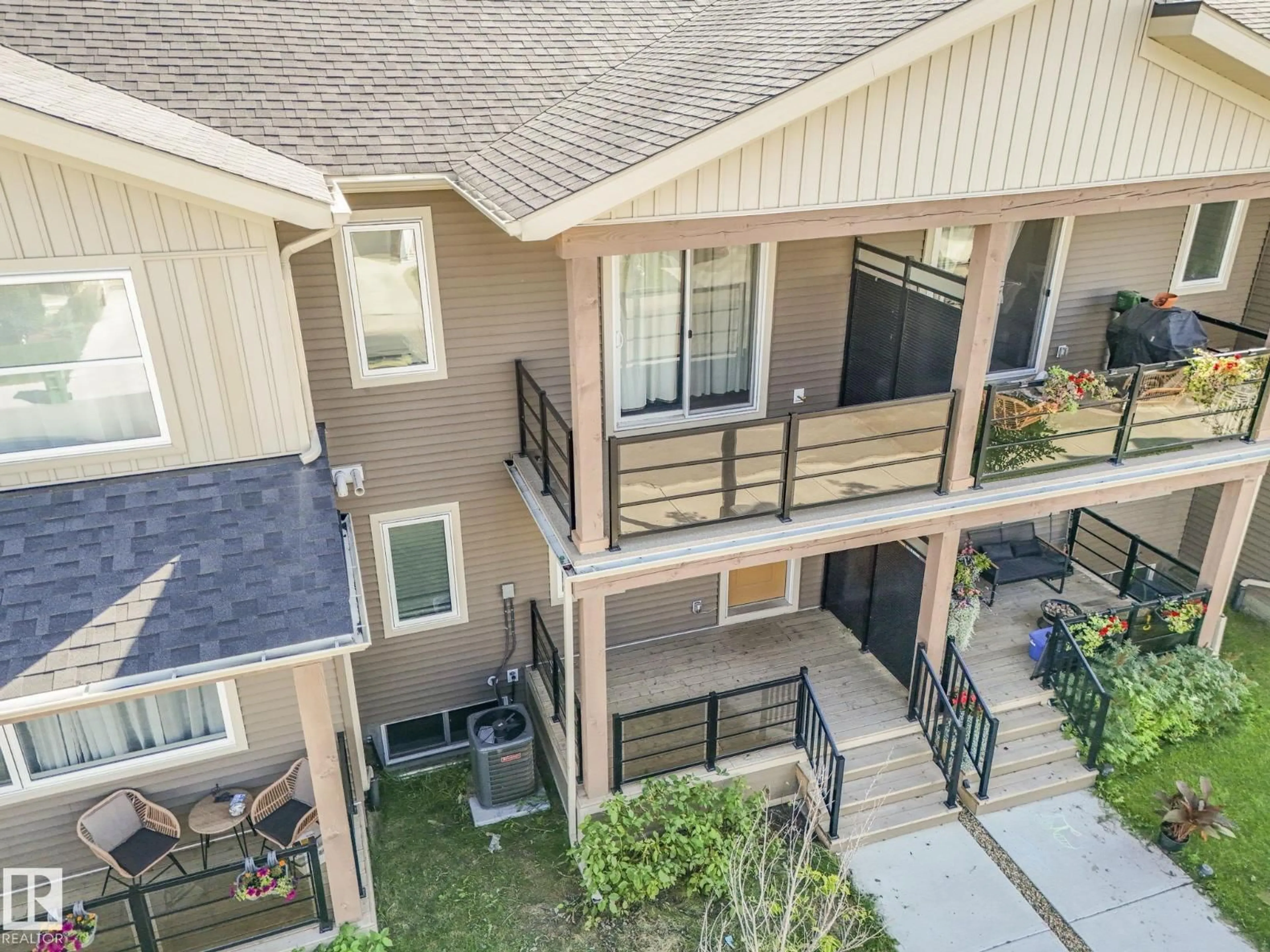 A pic from outside/outdoor area/front of a property/back of a property/a pic from drone, unknown for NW - 20241 15A AV, Edmonton Alberta T6M1L5