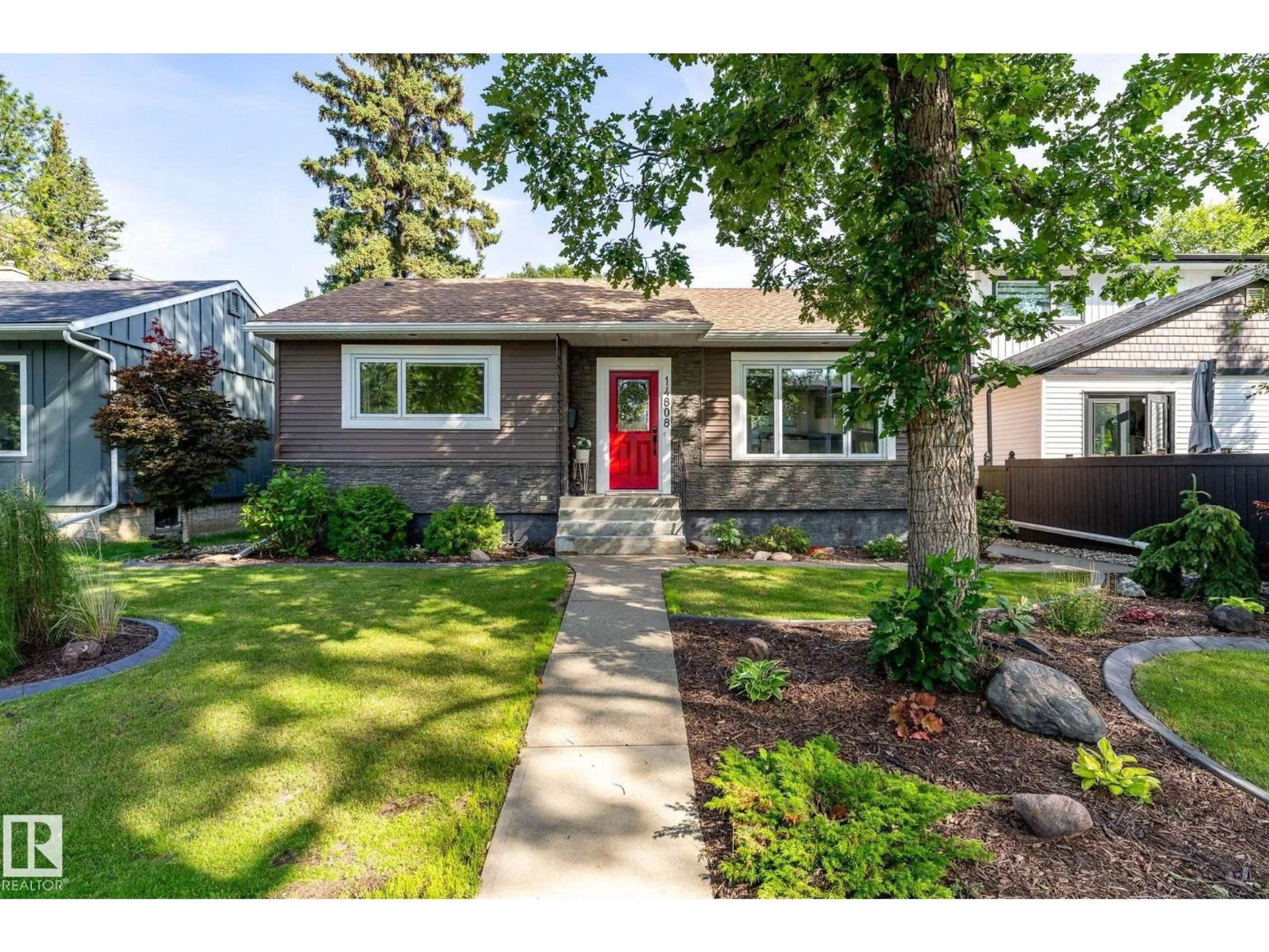 Home with brick exterior material, street for 14808 93 AV, Edmonton Alberta T5R5G9