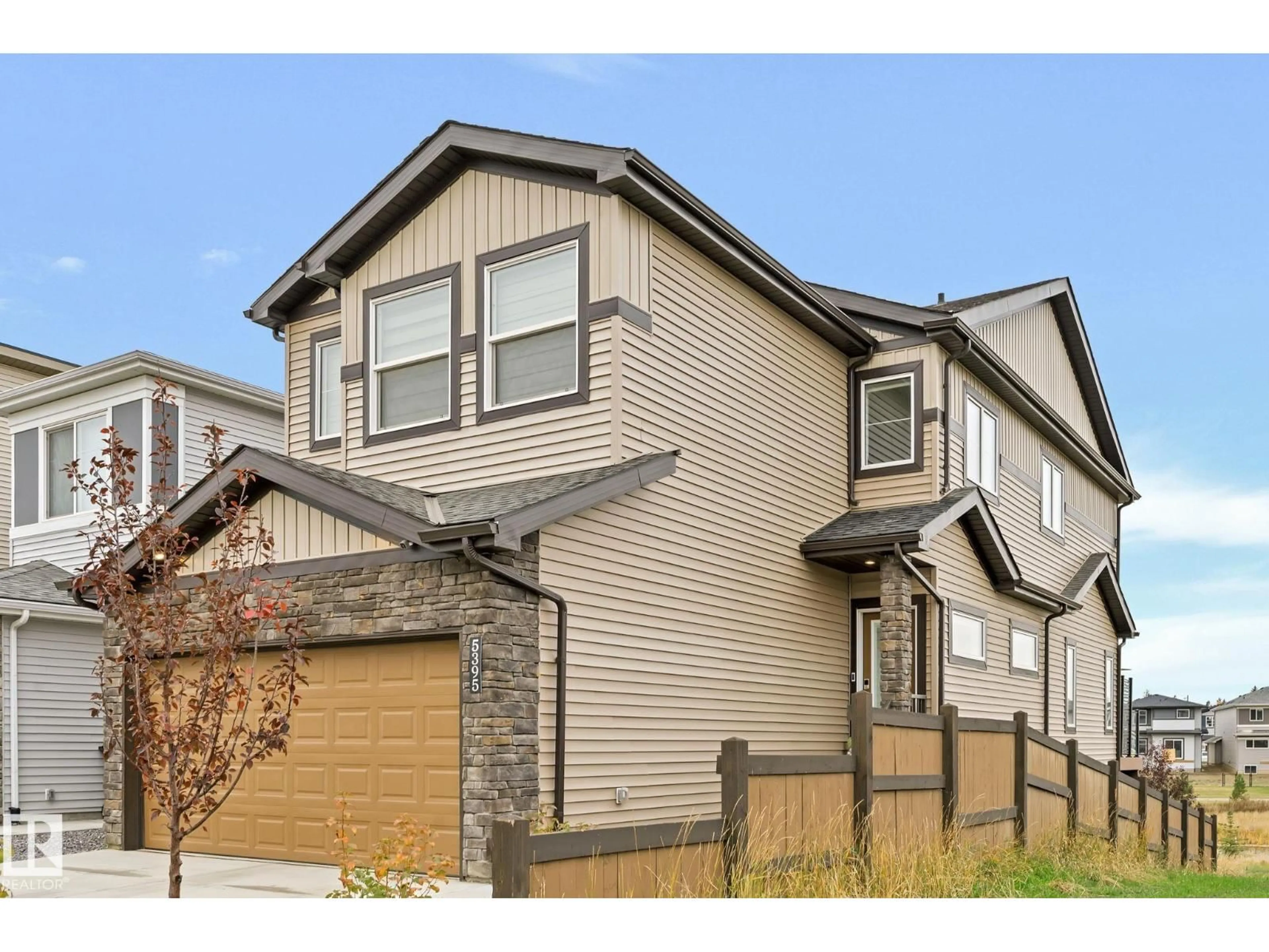 Home with vinyl exterior material, street for 5395 LARK LD, Edmonton Alberta T5S0S3