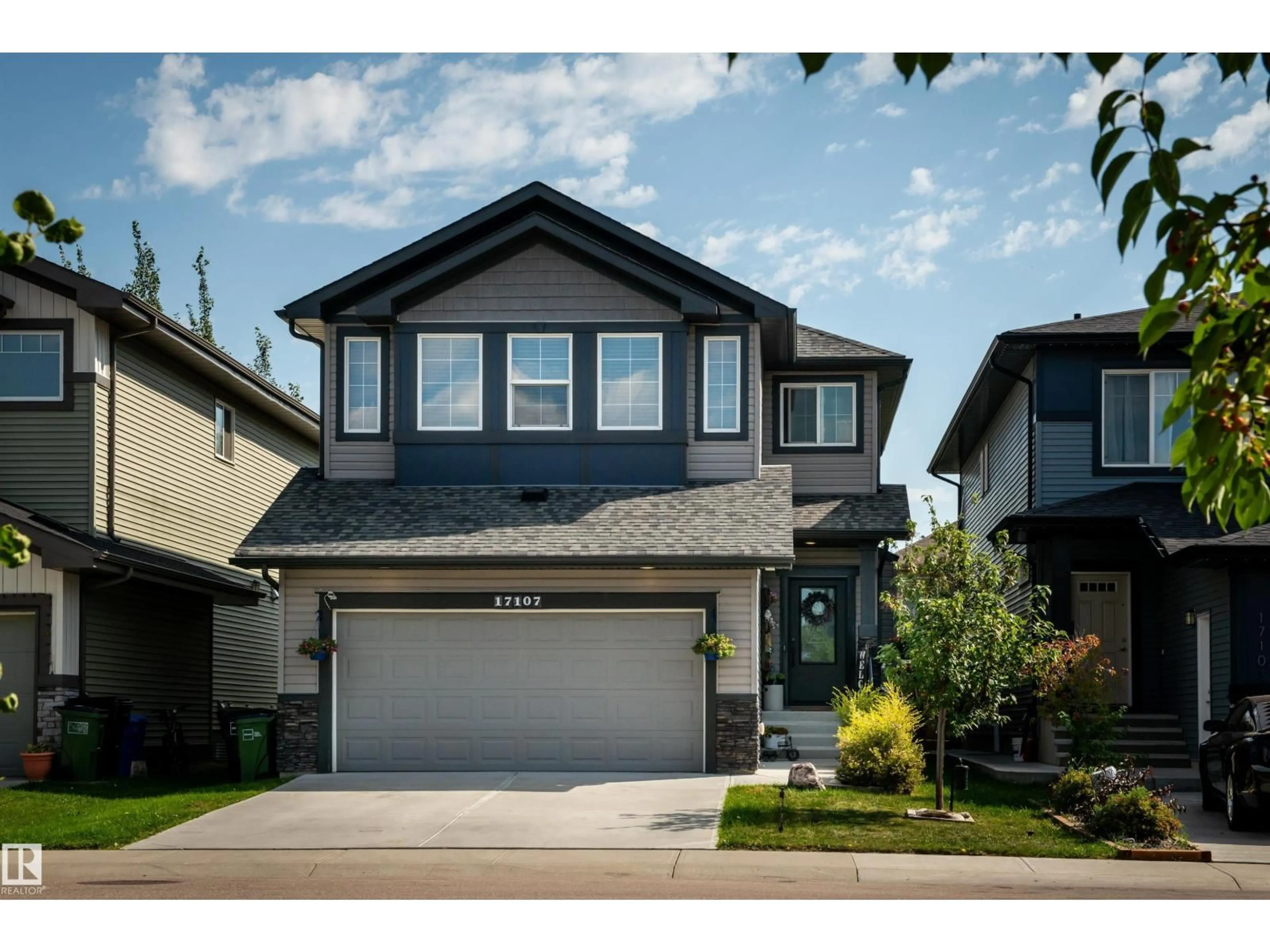 Home with vinyl exterior material, street for 17107 81 ST, Edmonton Alberta T5Z0E1