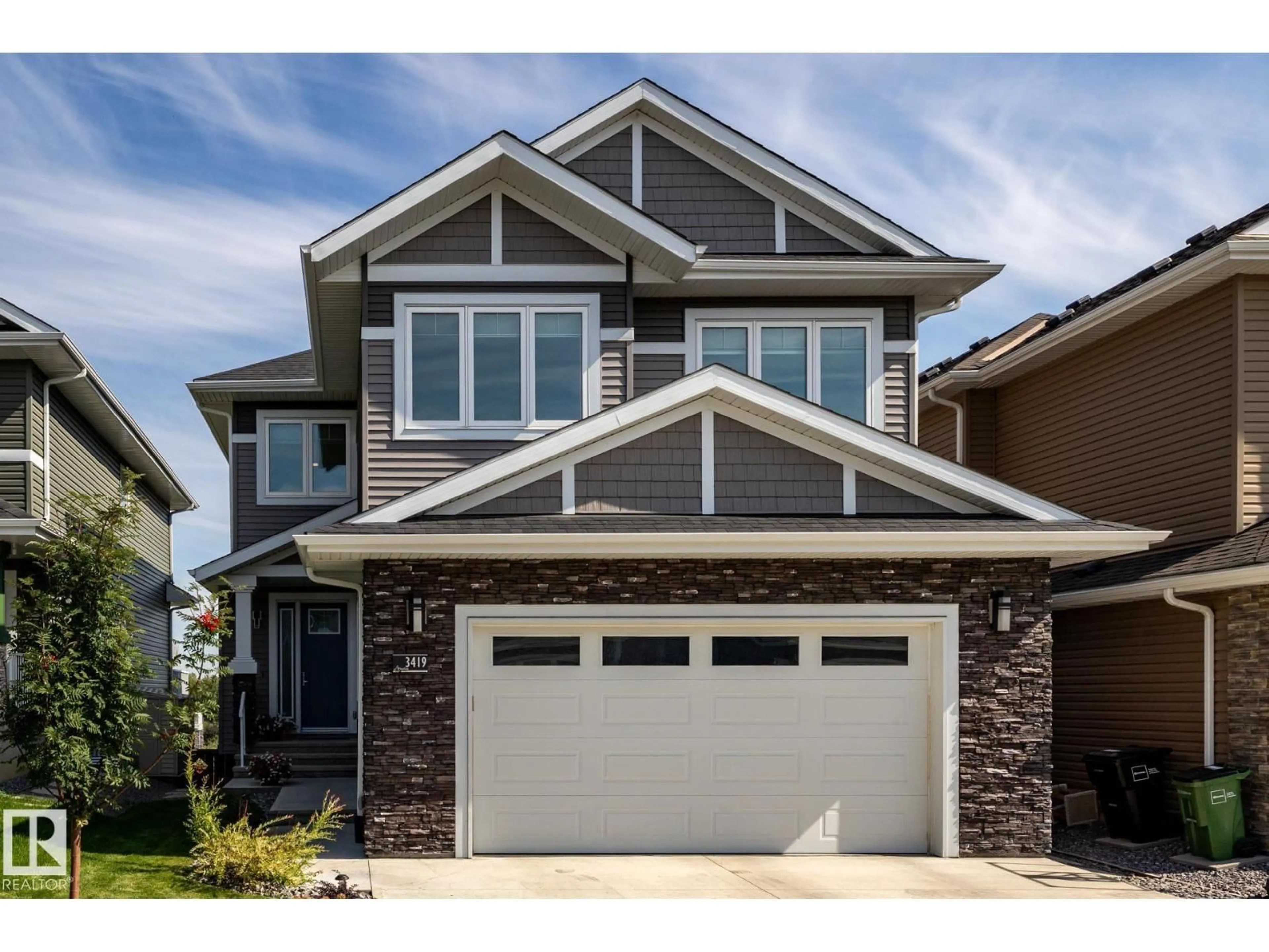 Home with vinyl exterior material, street for 3419 CHICKADEE DR, Edmonton Alberta T5S0L1
