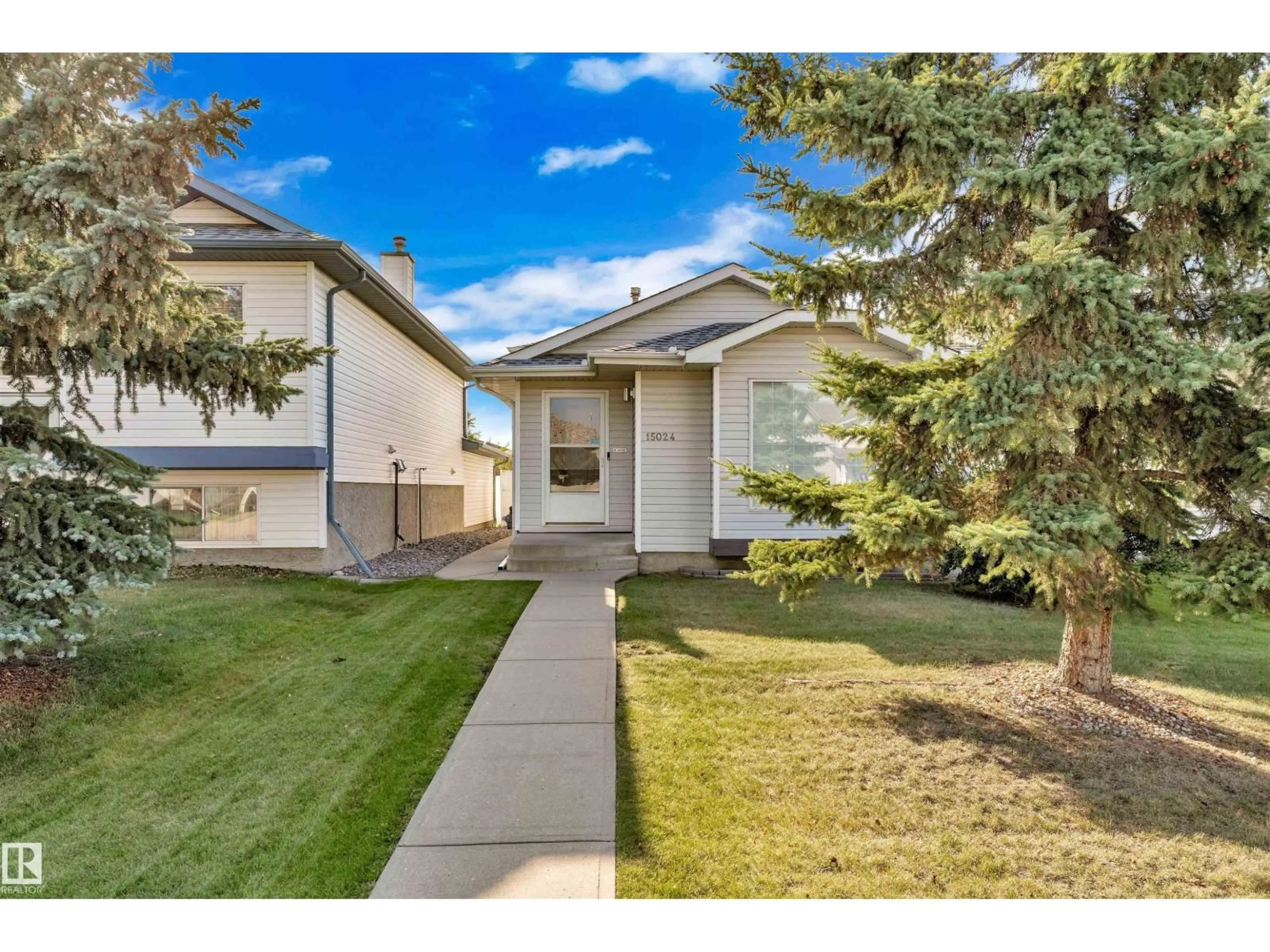 Home with vinyl exterior material, street for 15024 128 ST, Edmonton Alberta T6V1E9
