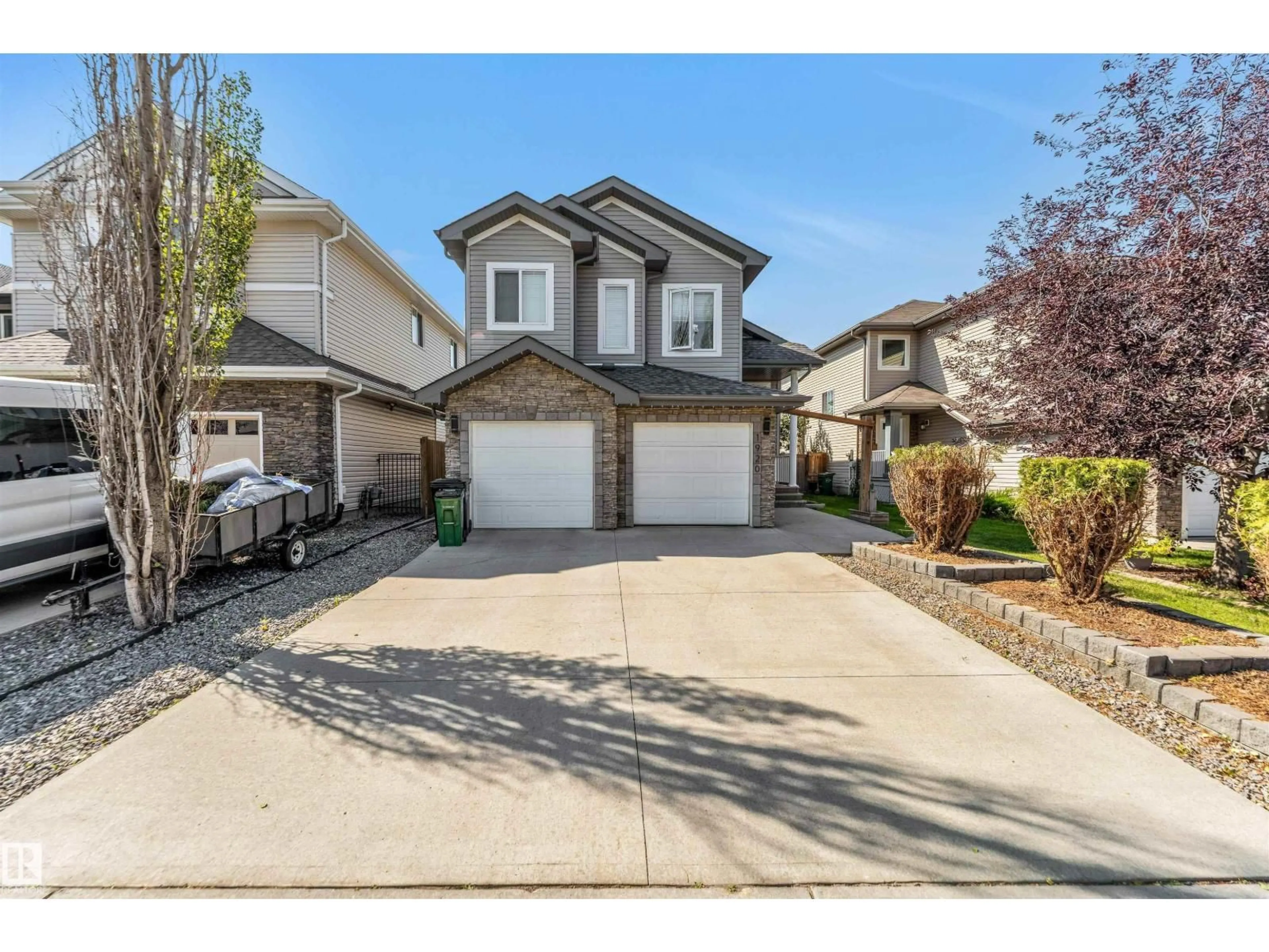 Home with vinyl exterior material, street for SW - 1920 69 ST, Edmonton Alberta T6X0L8