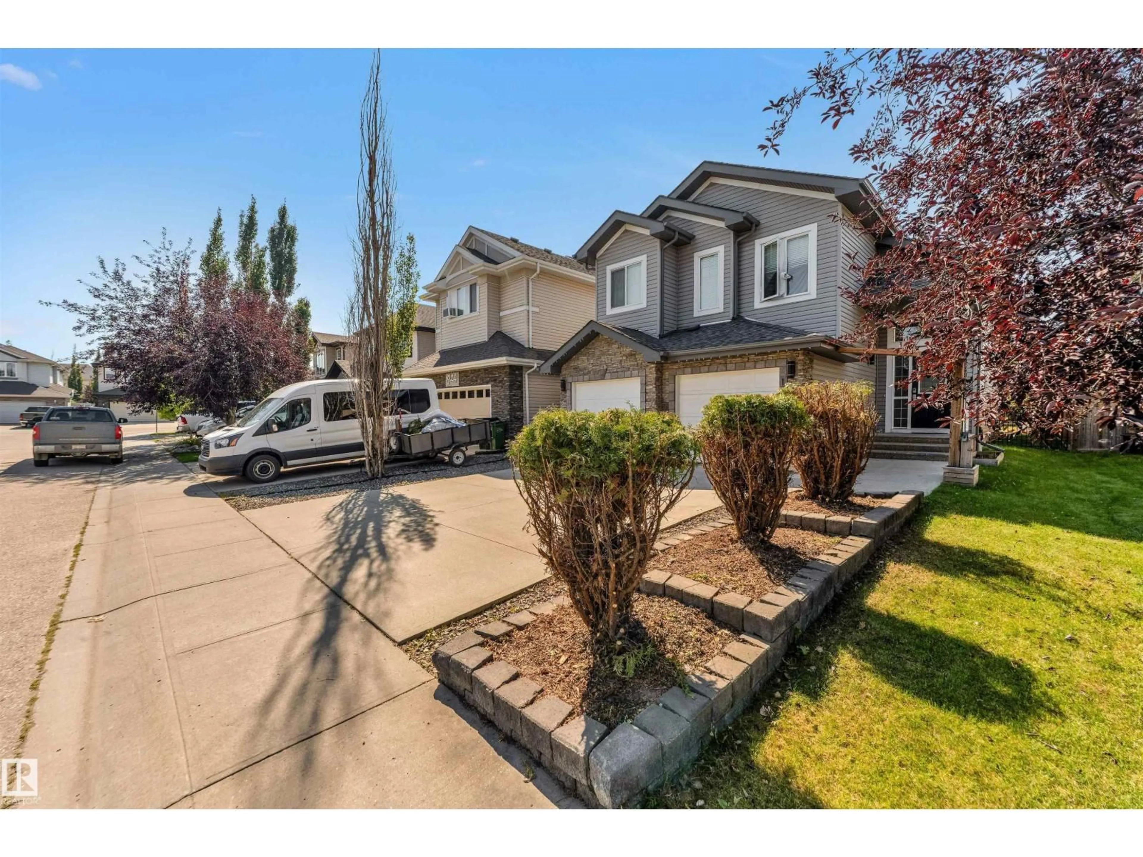 Home with vinyl exterior material, street for SW - 1920 69 ST, Edmonton Alberta T6X0L8
