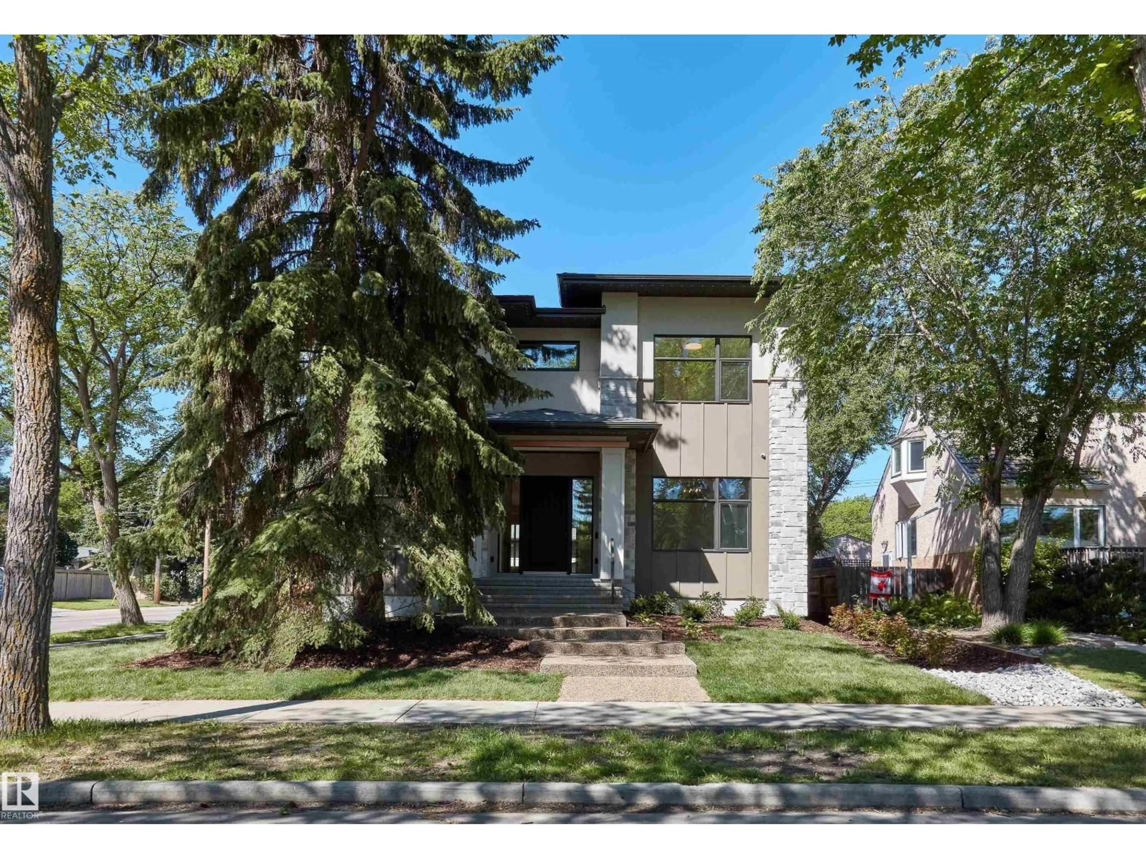 Home with brick exterior material, street for 9704 146 ST, Edmonton Alberta T5N2Z4