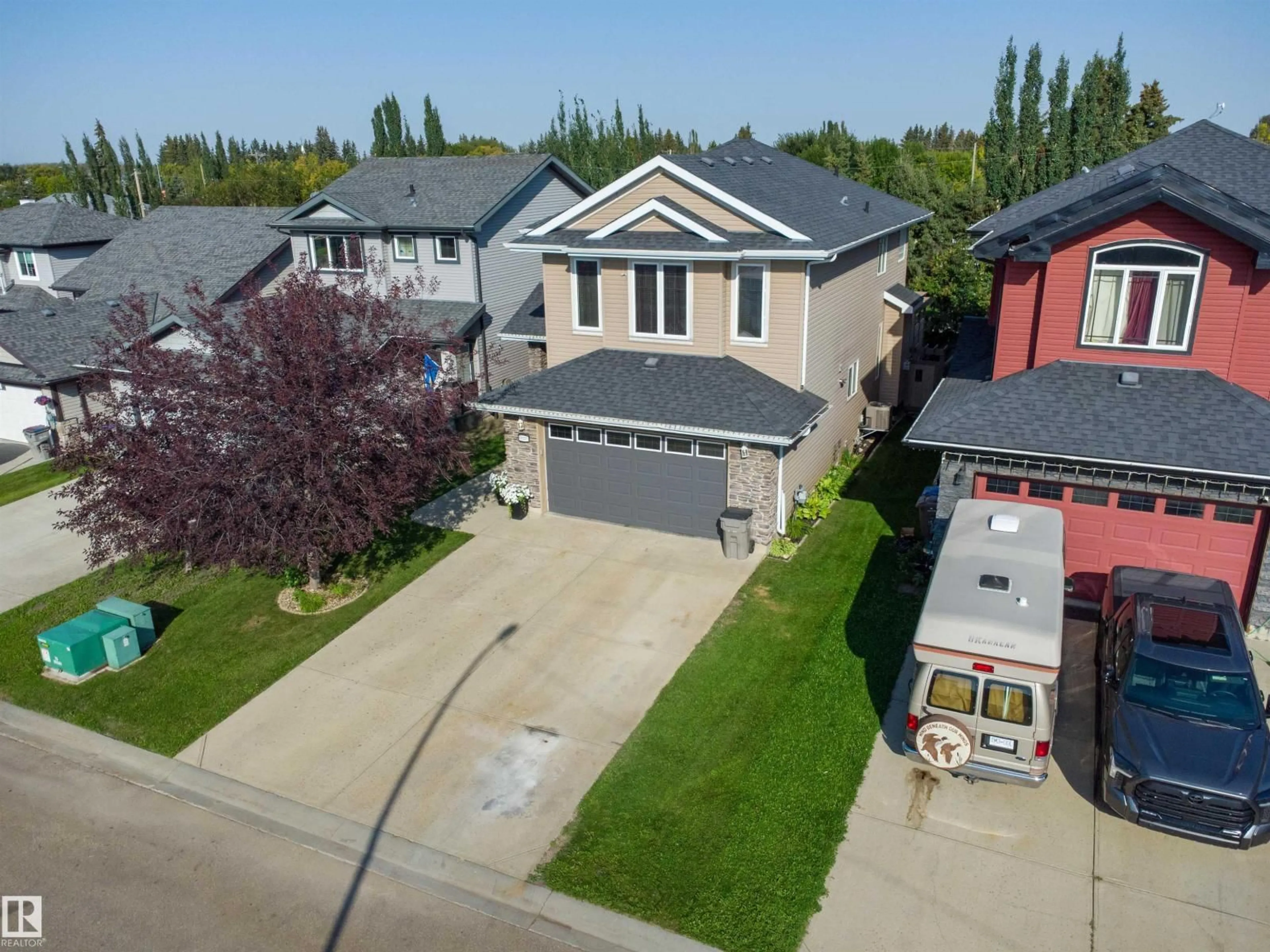 A pic from outside/outdoor area/front of a property/back of a property/a pic from drone, street for 9 SOUTHBRIDGE CRESCENT, Calmar Alberta T0C0V0