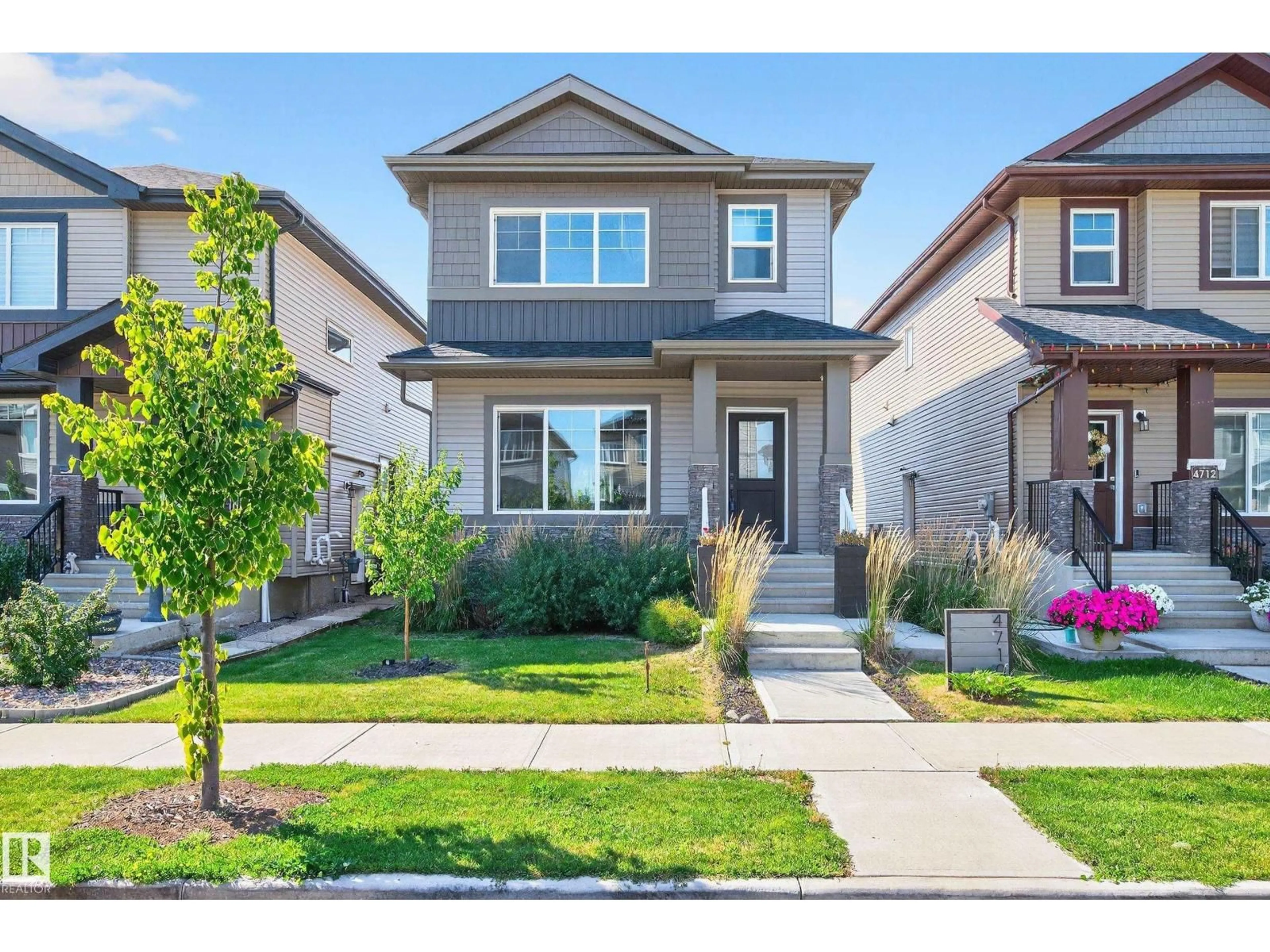 Home with vinyl exterior material, street for 4710 35 ST, Beaumont Alberta T4X2Y4