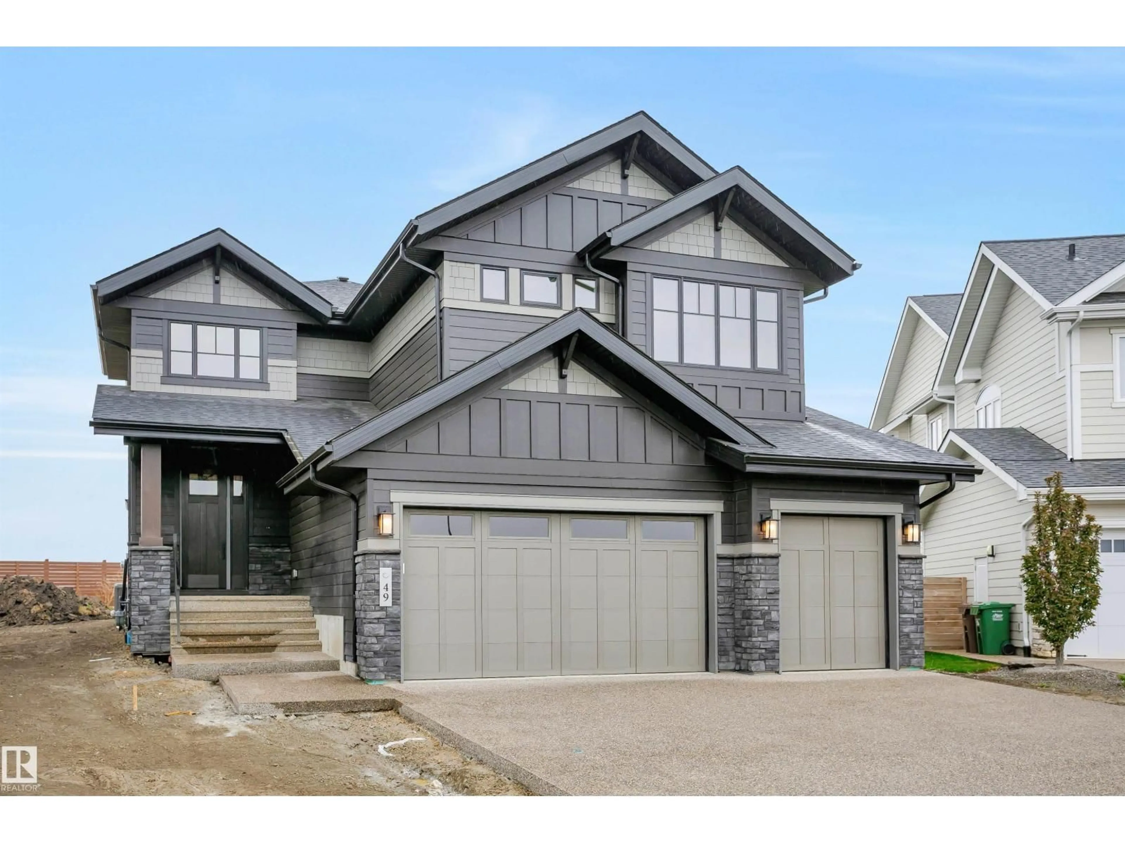 Home with vinyl exterior material, street for 49 JUBILATION DR, St. Albert Alberta T8N7W7