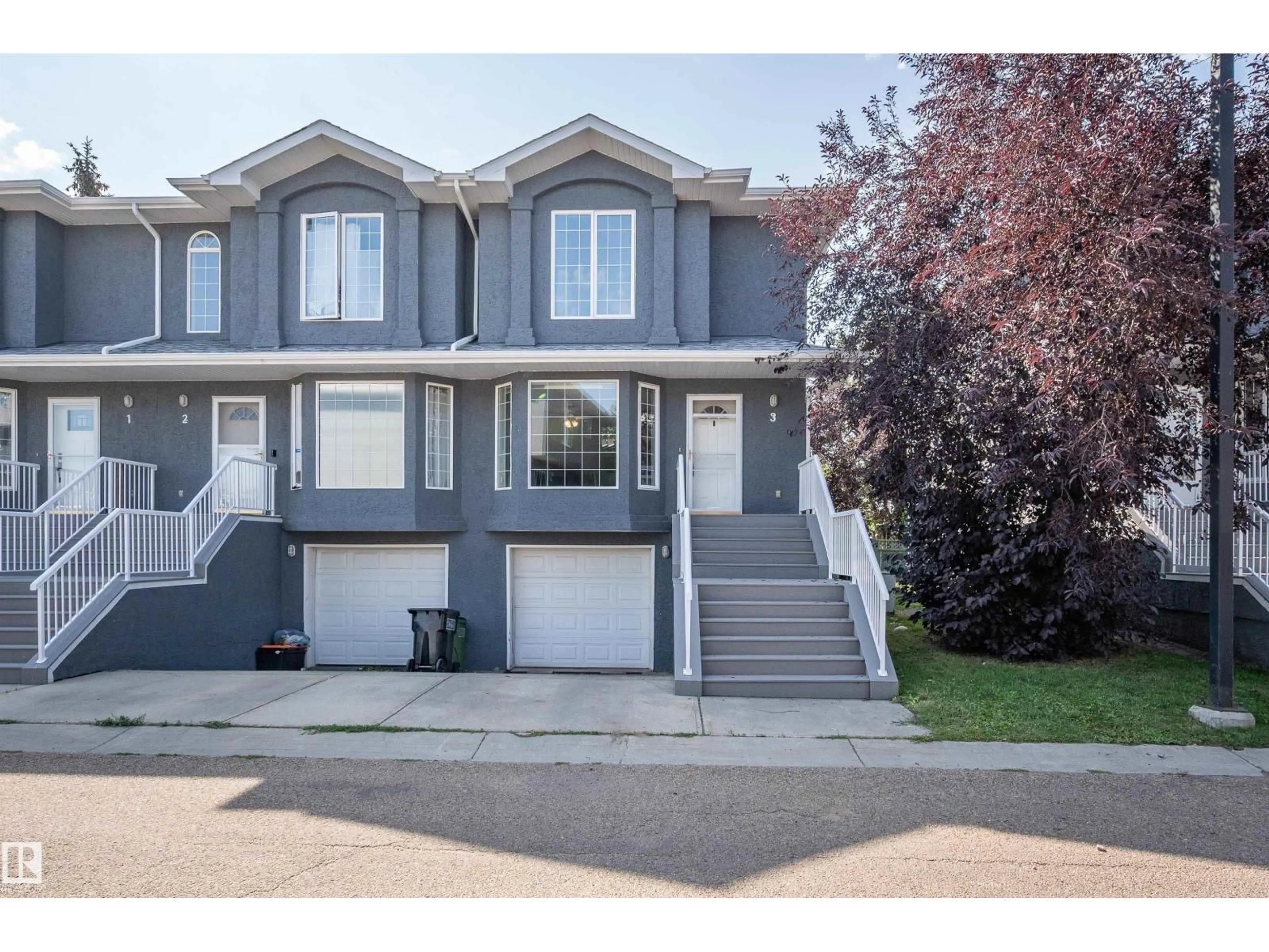 Home with vinyl exterior material, street for #3 - 15128 22 ST, Edmonton Alberta T5Y2W5