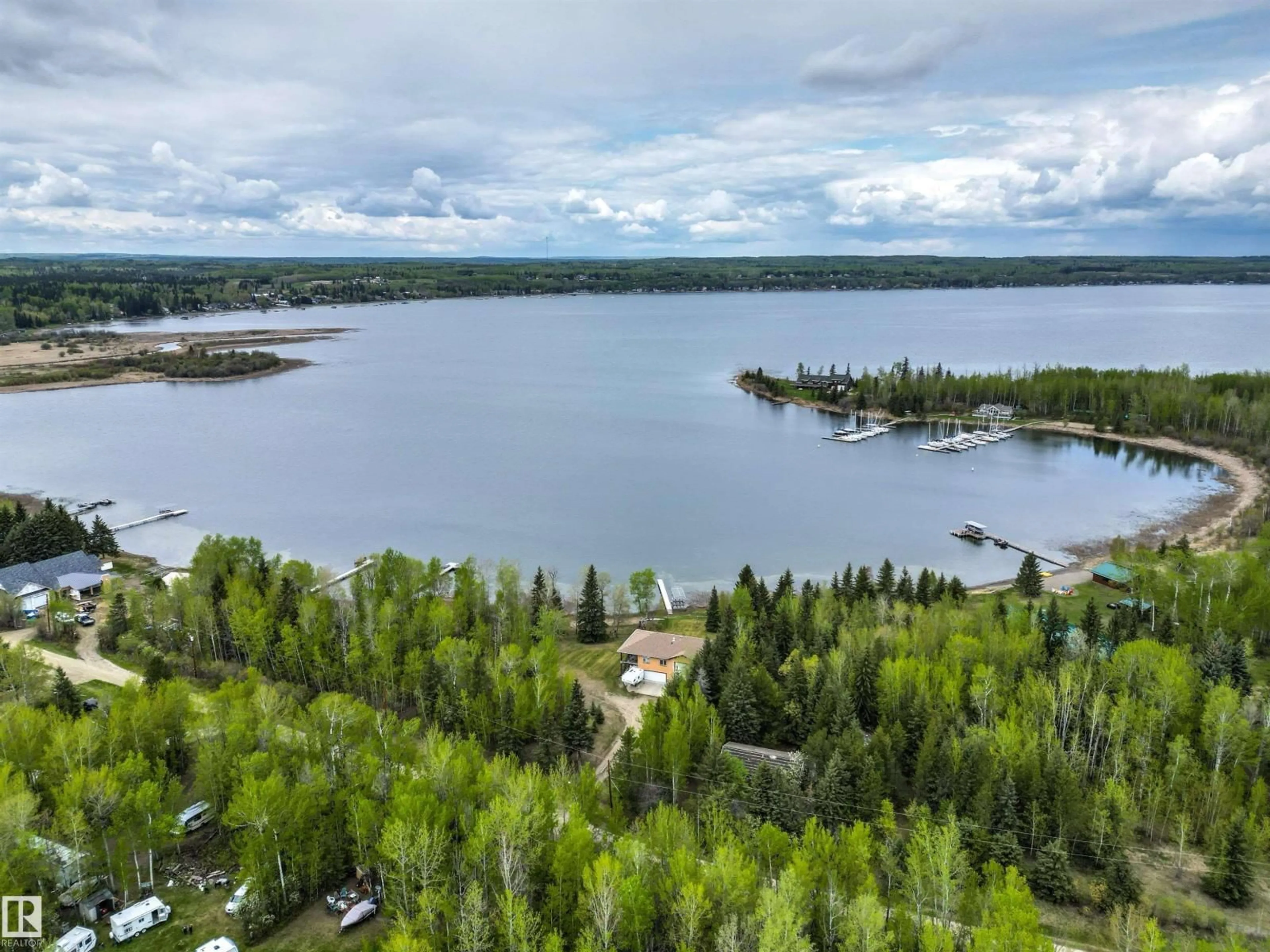 A pic from outside/outdoor area/front of a property/back of a property/a pic from drone, water/lake/river/ocean view for 4 SUNSHINE BAY RD, Rural Parkland County Alberta T0E0V0