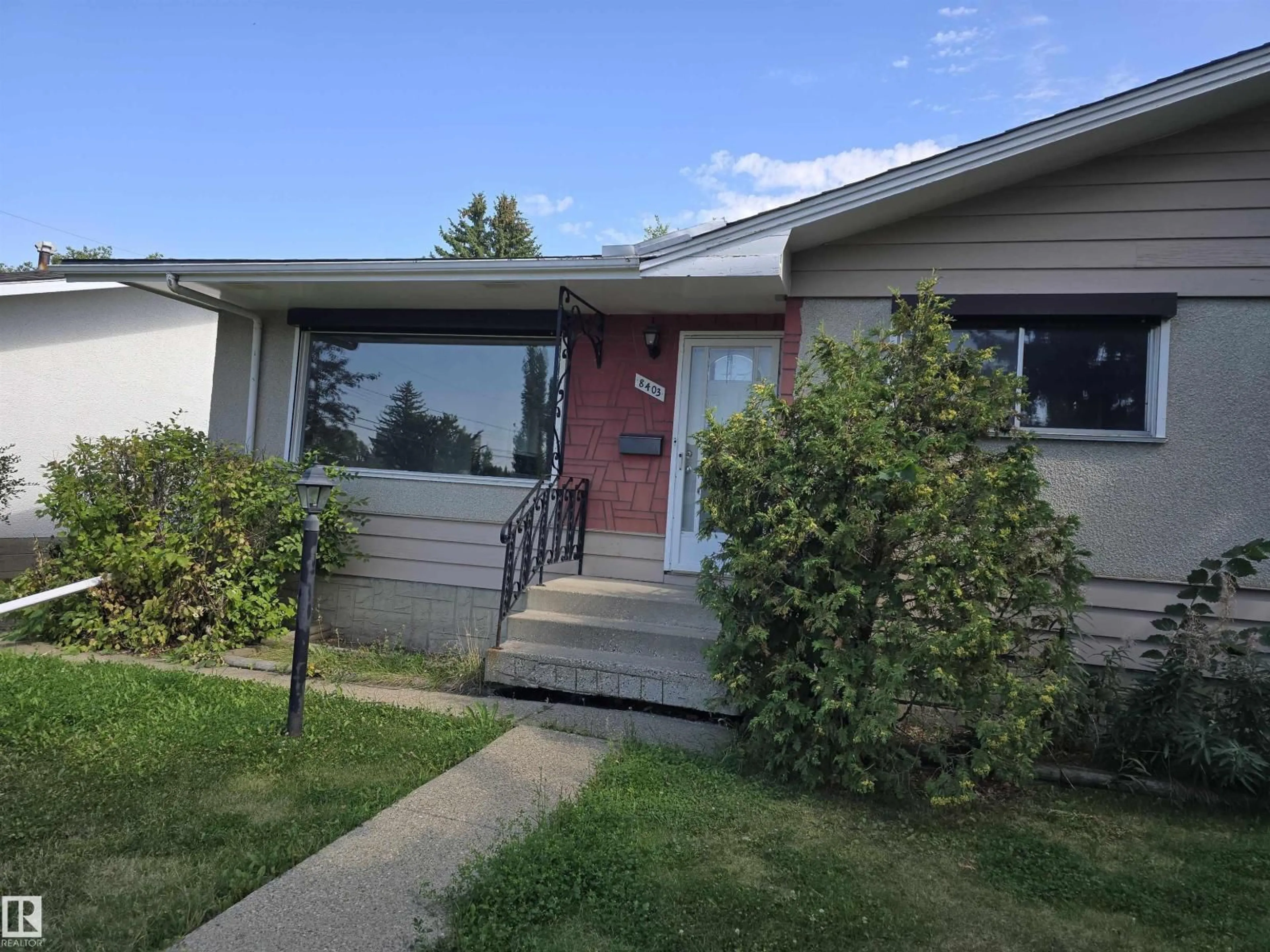 Home with vinyl exterior material, street for NW - 8403 161 ST, Edmonton Alberta T5R2K7