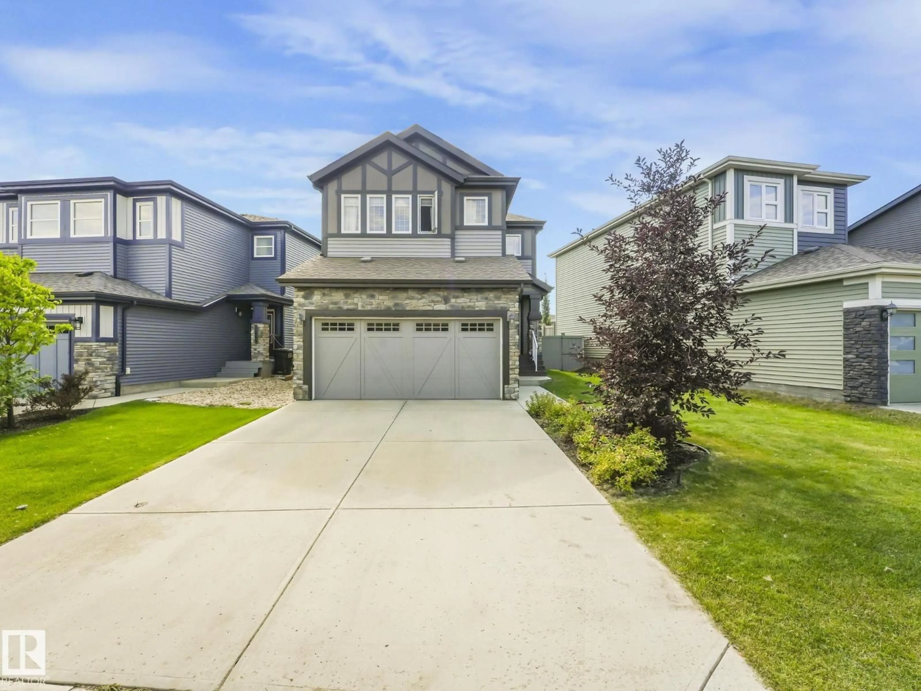 Home with vinyl exterior material, street for 22119 87 AV, Edmonton Alberta T5T7H7