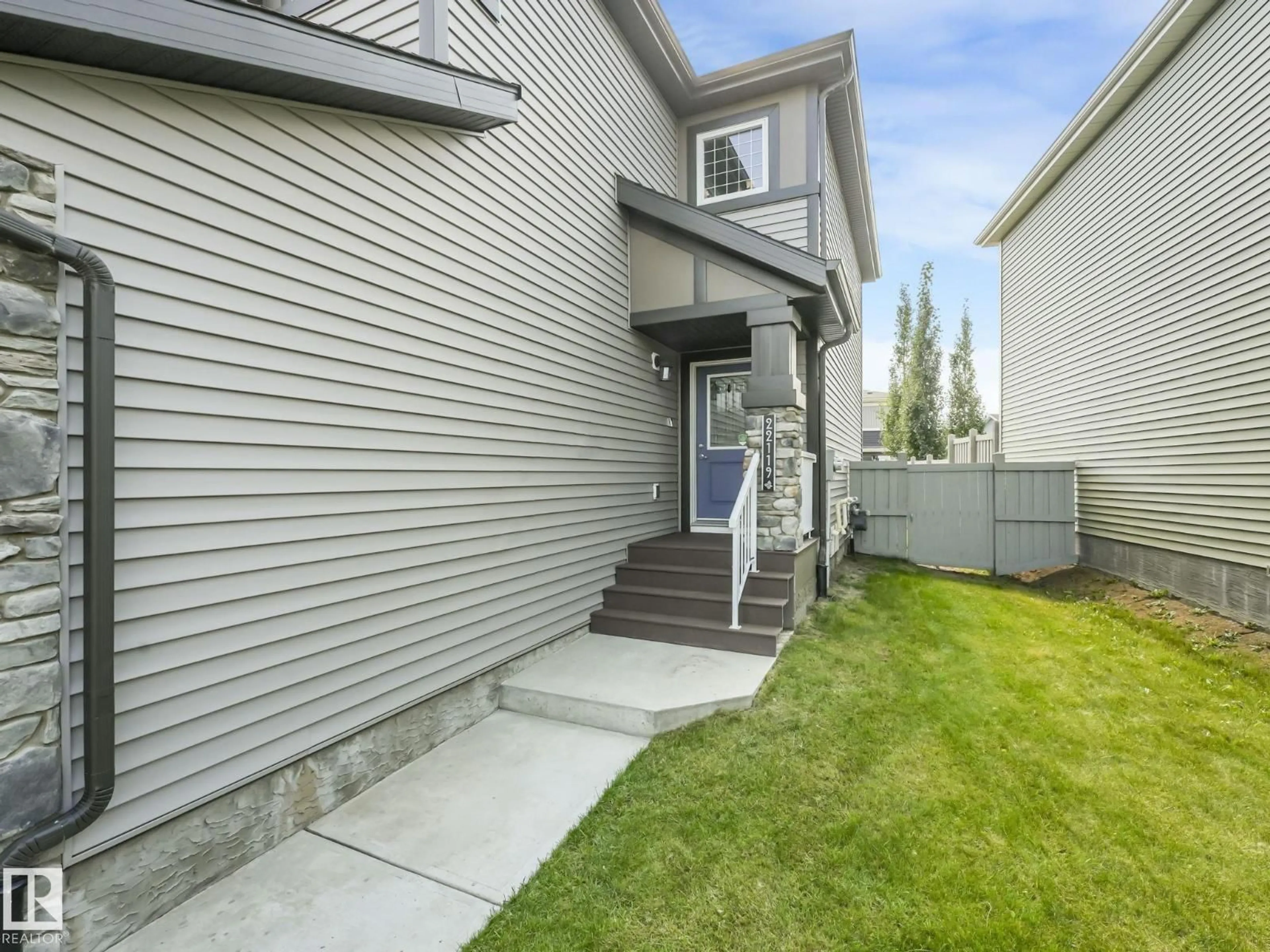Home with vinyl exterior material, street for 22119 87 AV, Edmonton Alberta T5T7H7