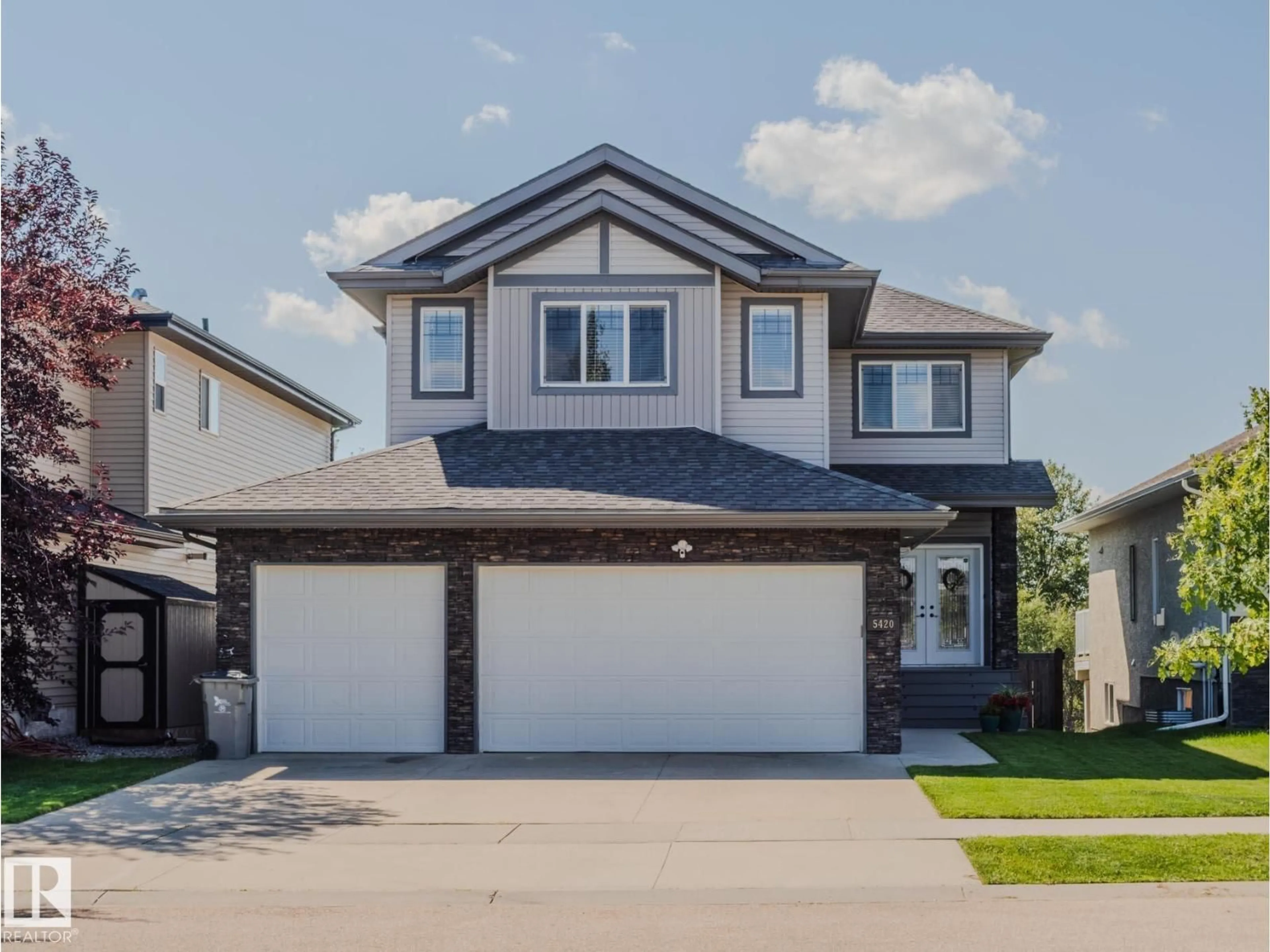 Home with vinyl exterior material, street for 5420 64 ST, Beaumont Alberta T4X0H2