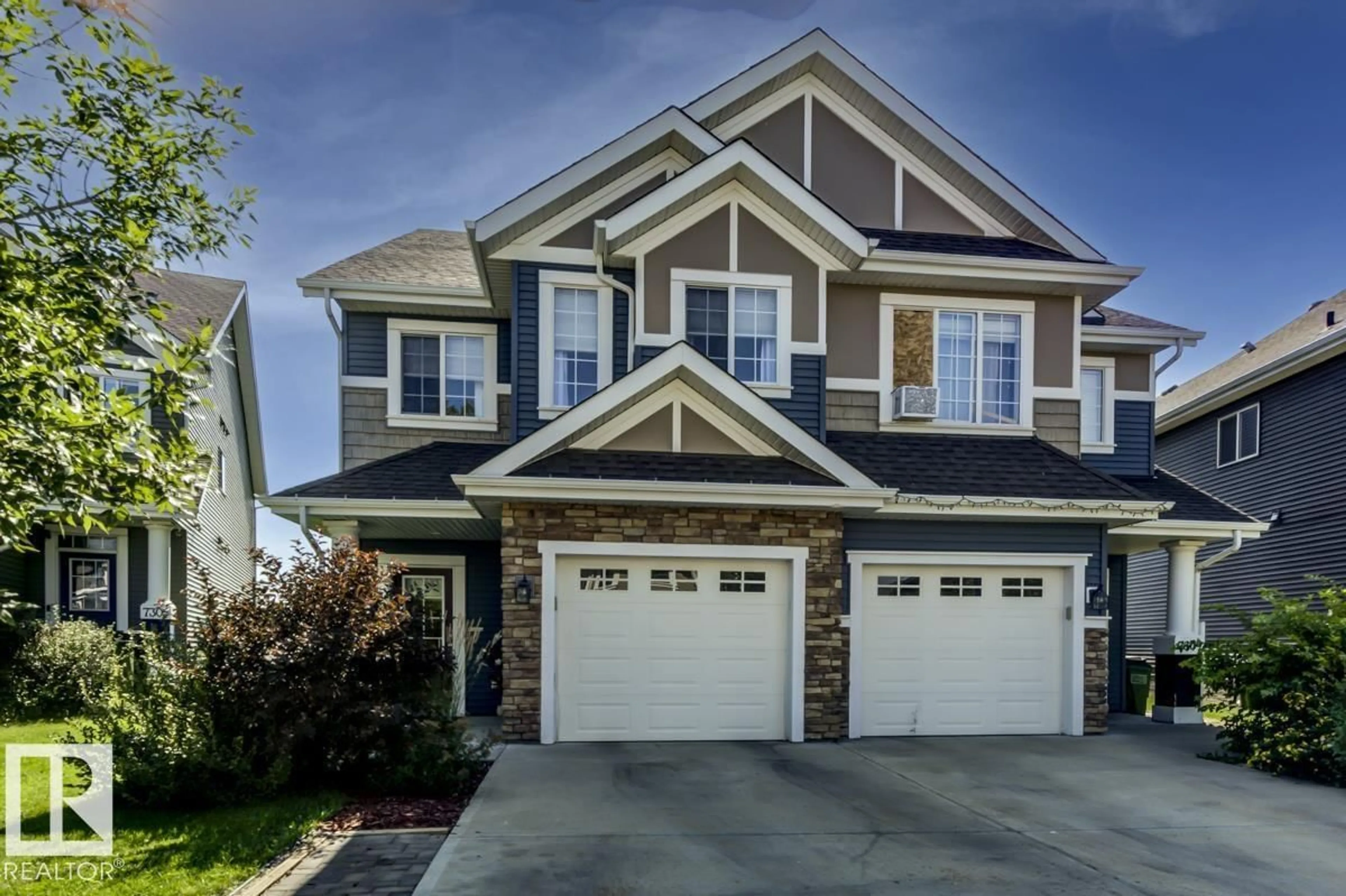 Home with vinyl exterior material, street for 7307 24 AV, Edmonton Alberta T6X0V5