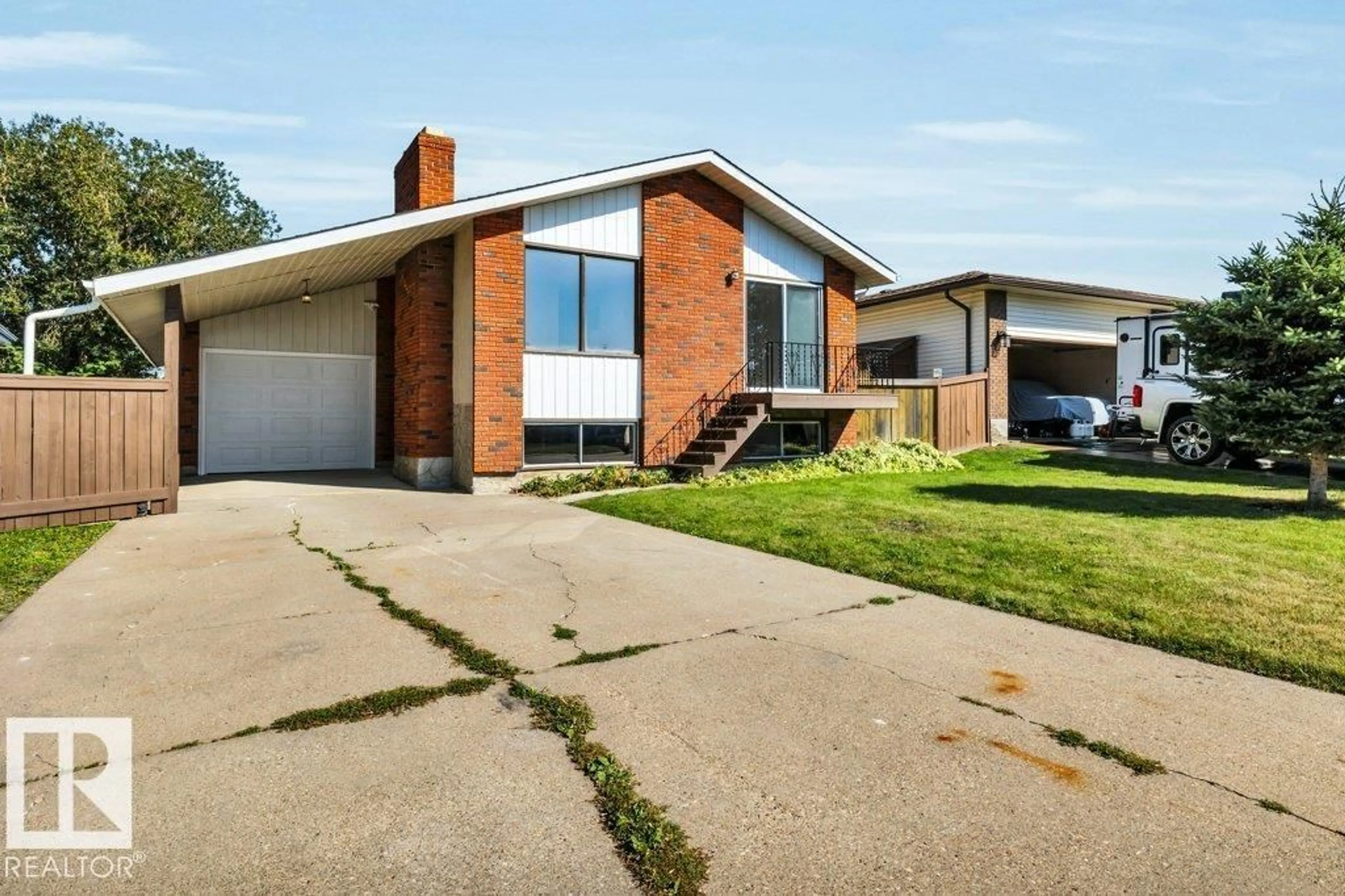 Home with brick exterior material, street for 2131 79 ST, Edmonton Alberta T6K2E7