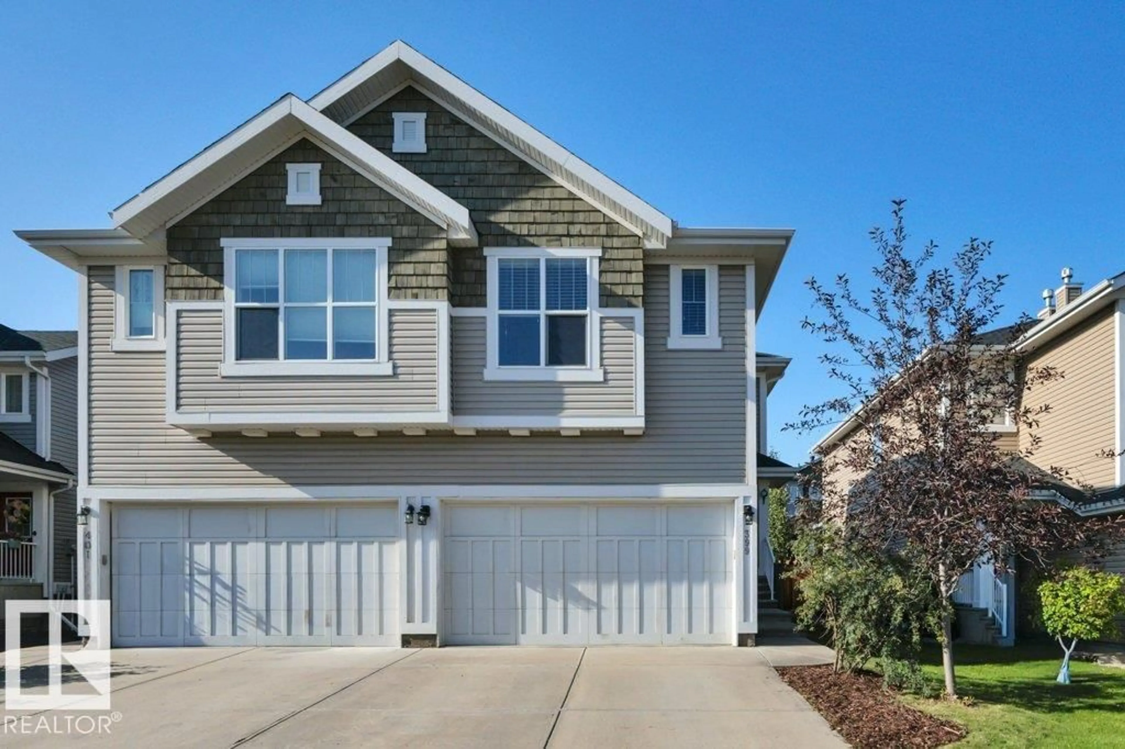 Home with vinyl exterior material, street for 399 SIMMONDS WY, Leduc Alberta T9E0T9