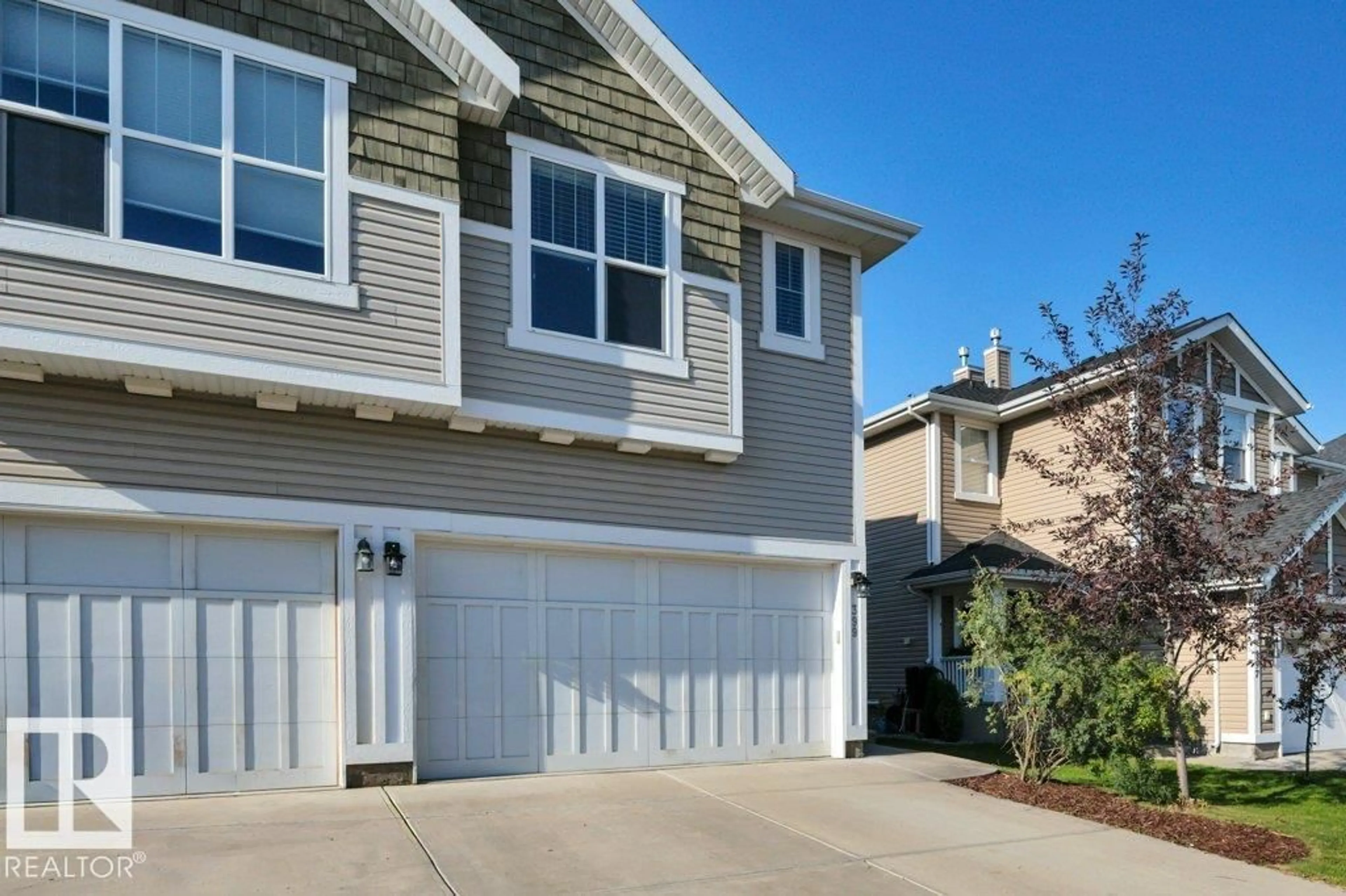 Home with vinyl exterior material, street for 399 SIMMONDS WY, Leduc Alberta T9E0T9