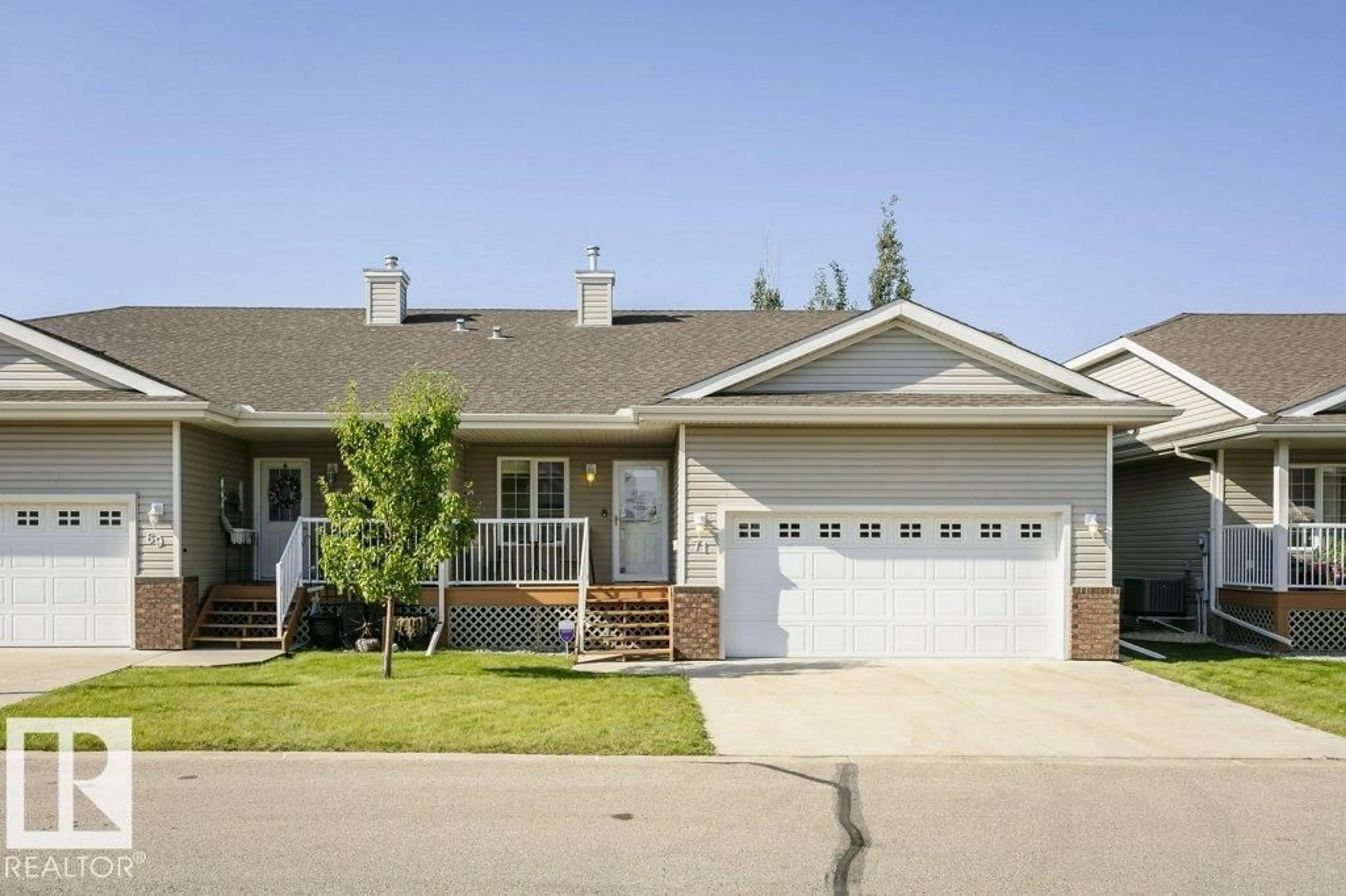 Home with vinyl exterior material, street for #71 - 8602 SOUTHFORT DR, Fort Saskatchewan Alberta T8L4R7