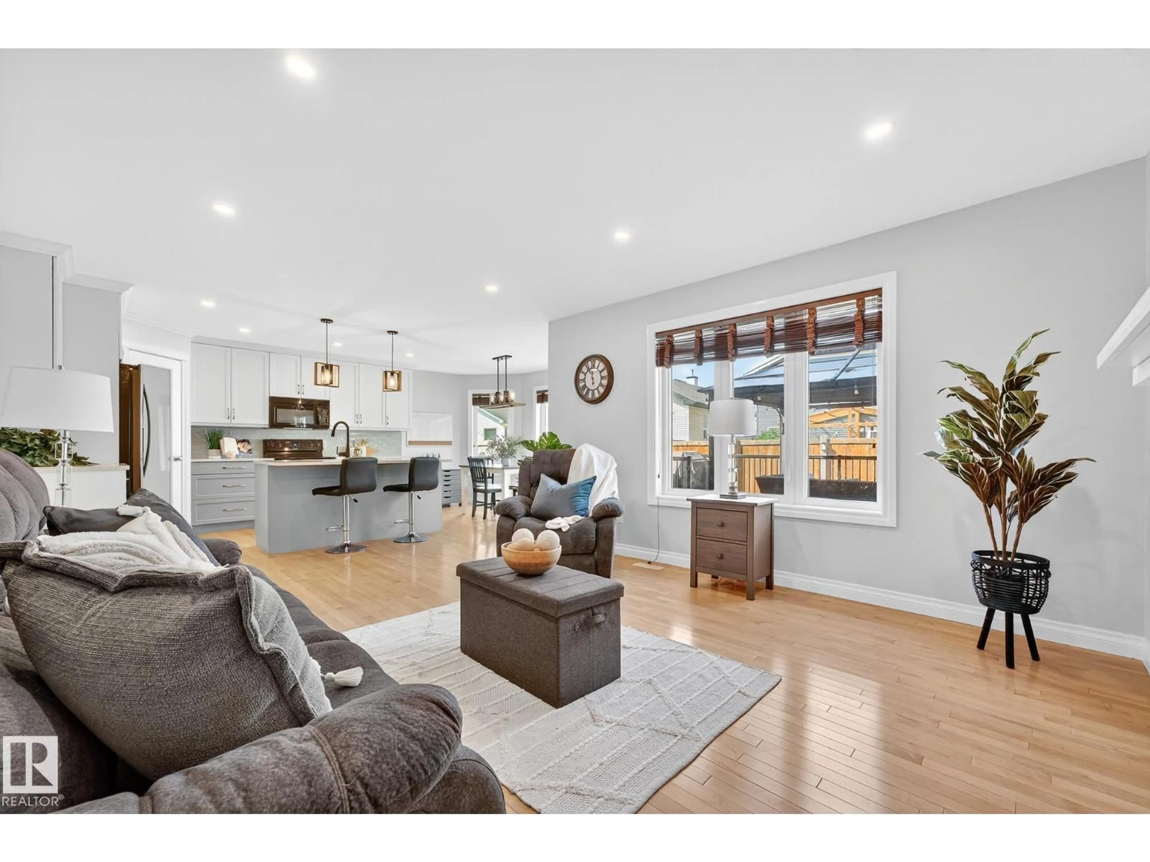 Open concept kitchen, wood/laminate floor for 64 WILLOWBY CL, Stony Plain Alberta T7Z2X5