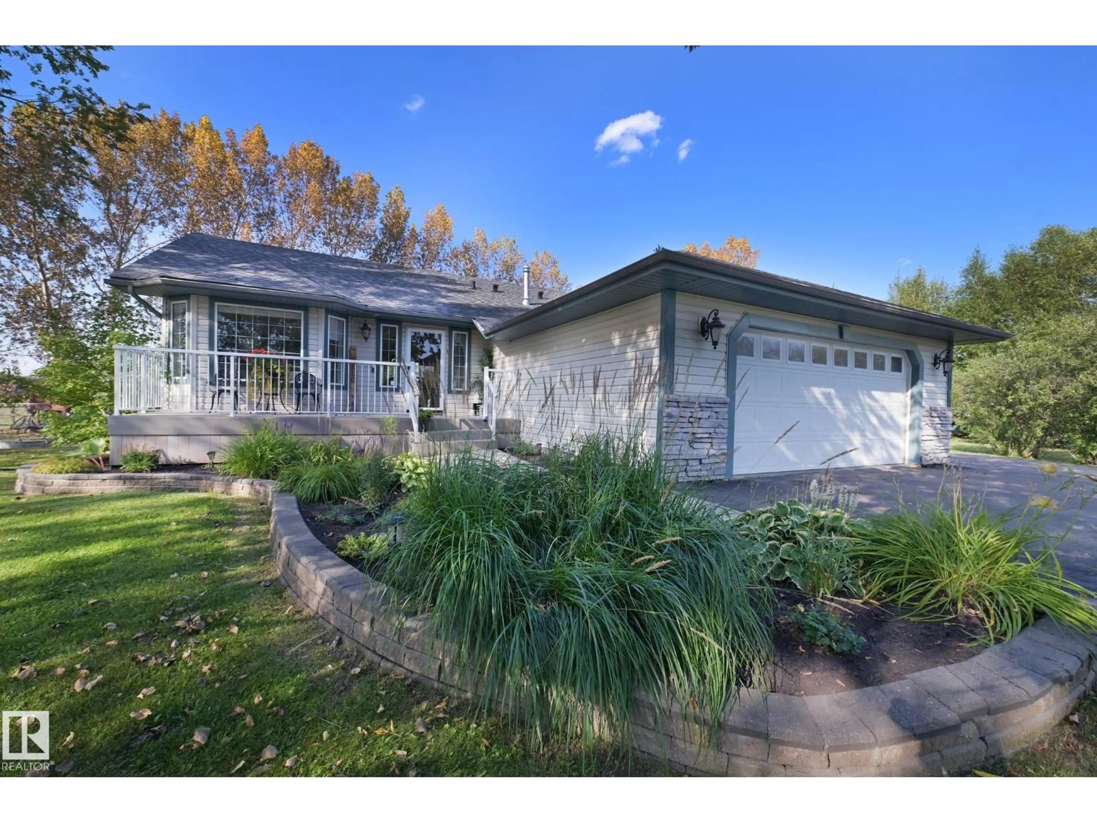 Home with vinyl exterior material, street for 98 - 52349 RGE RD 222, Rural Strathcona County Alberta T8C1A4