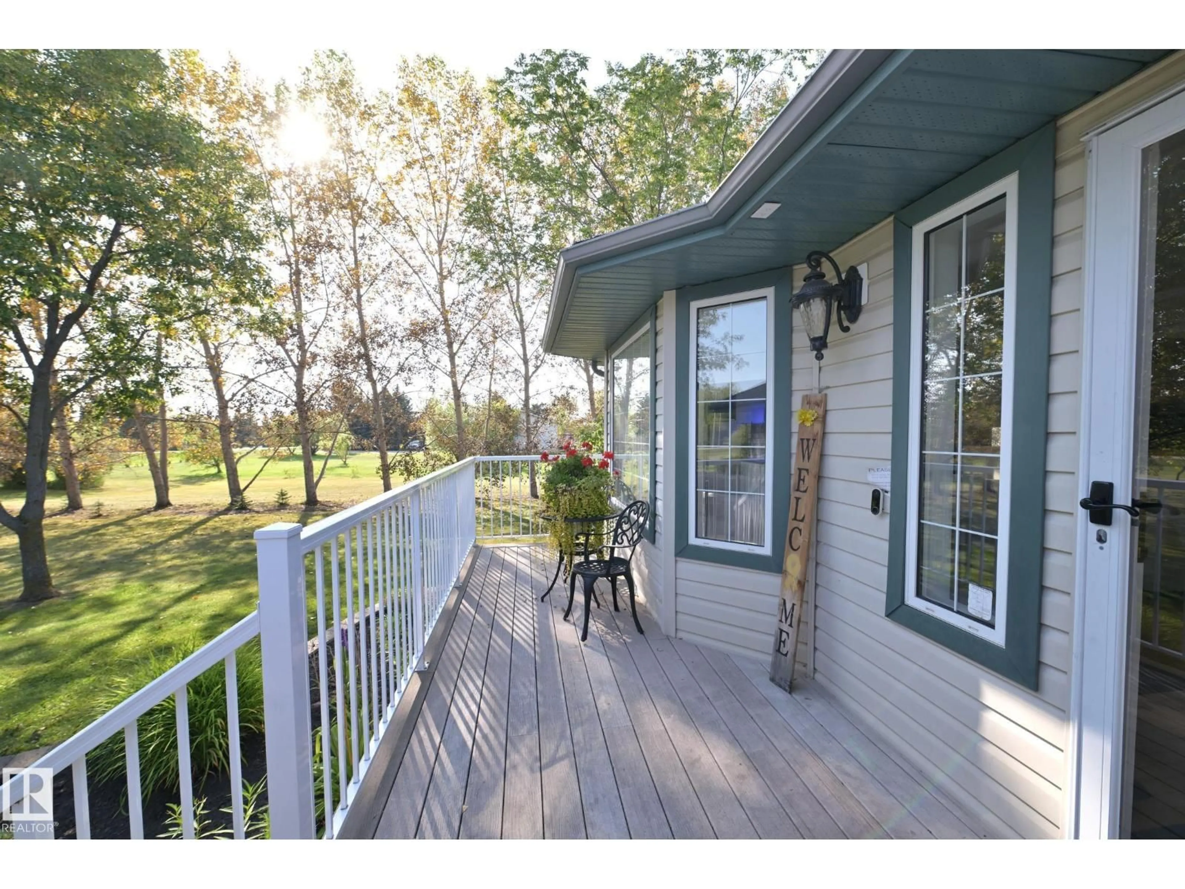 Patio, water/lake/river/ocean view for 98 - 52349 RGE RD 222, Rural Strathcona County Alberta T8C1A4