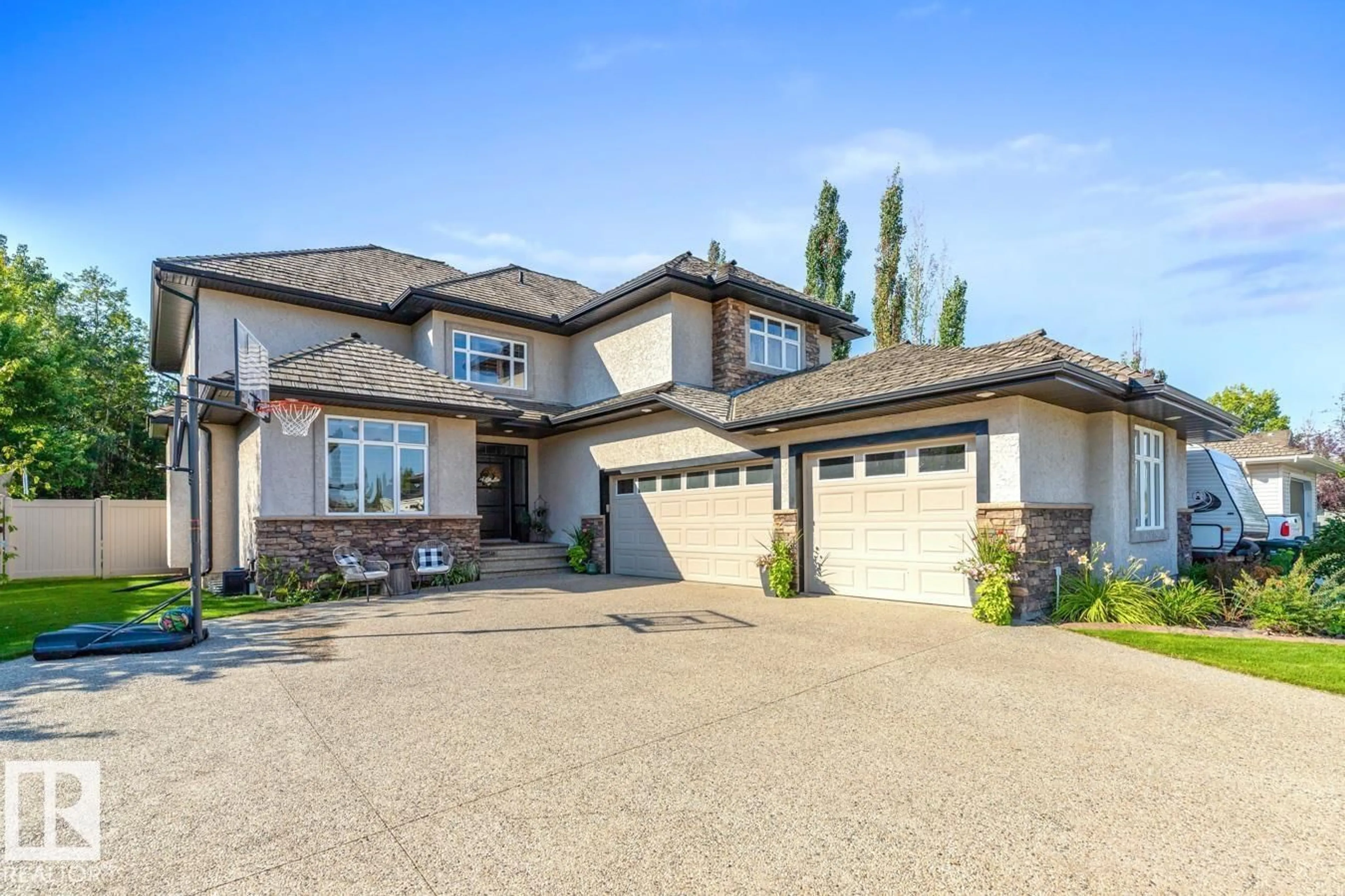 Home with vinyl exterior material, street for 408 52304 RGE ROAD 233, Rural Strathcona County Alberta T8B1C9