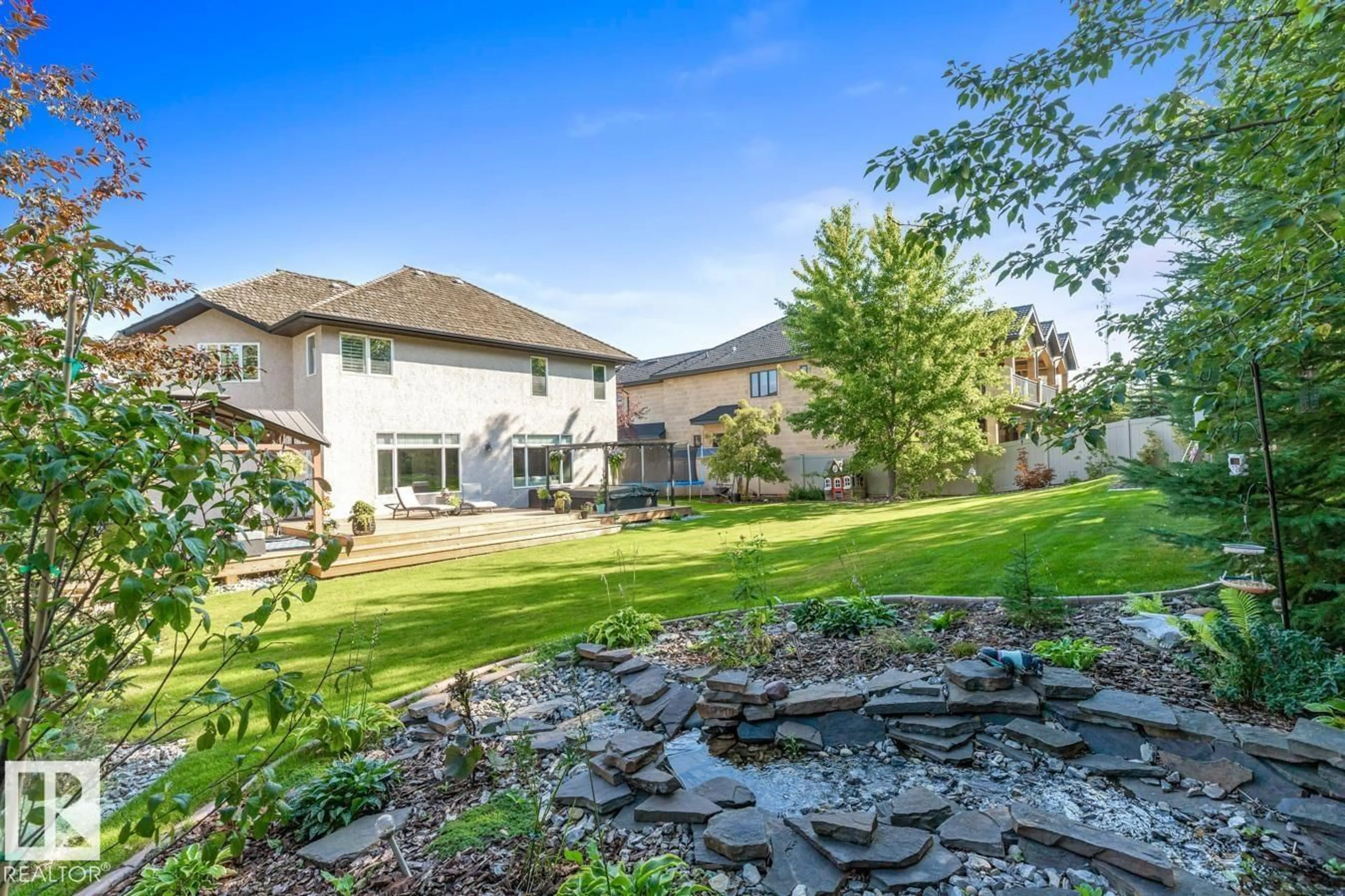 A pic from outside/outdoor area/front of a property/back of a property/a pic from drone, unknown for 408 52304 RGE ROAD 233, Rural Strathcona County Alberta T8B1C9