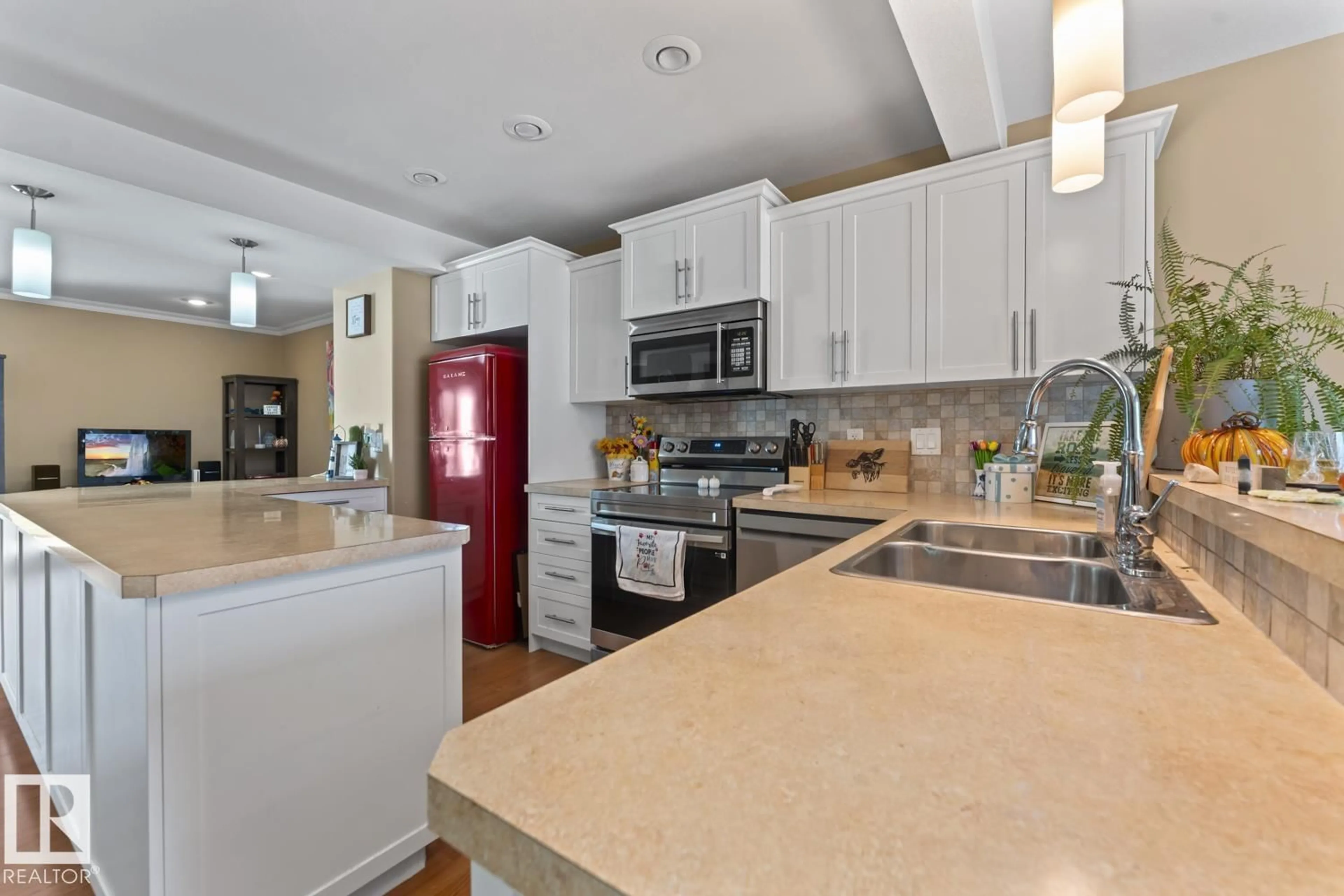 Open concept kitchen, ceramic/tile floor for 16 1001 7 AV, Cold Lake Alberta T9M0C4