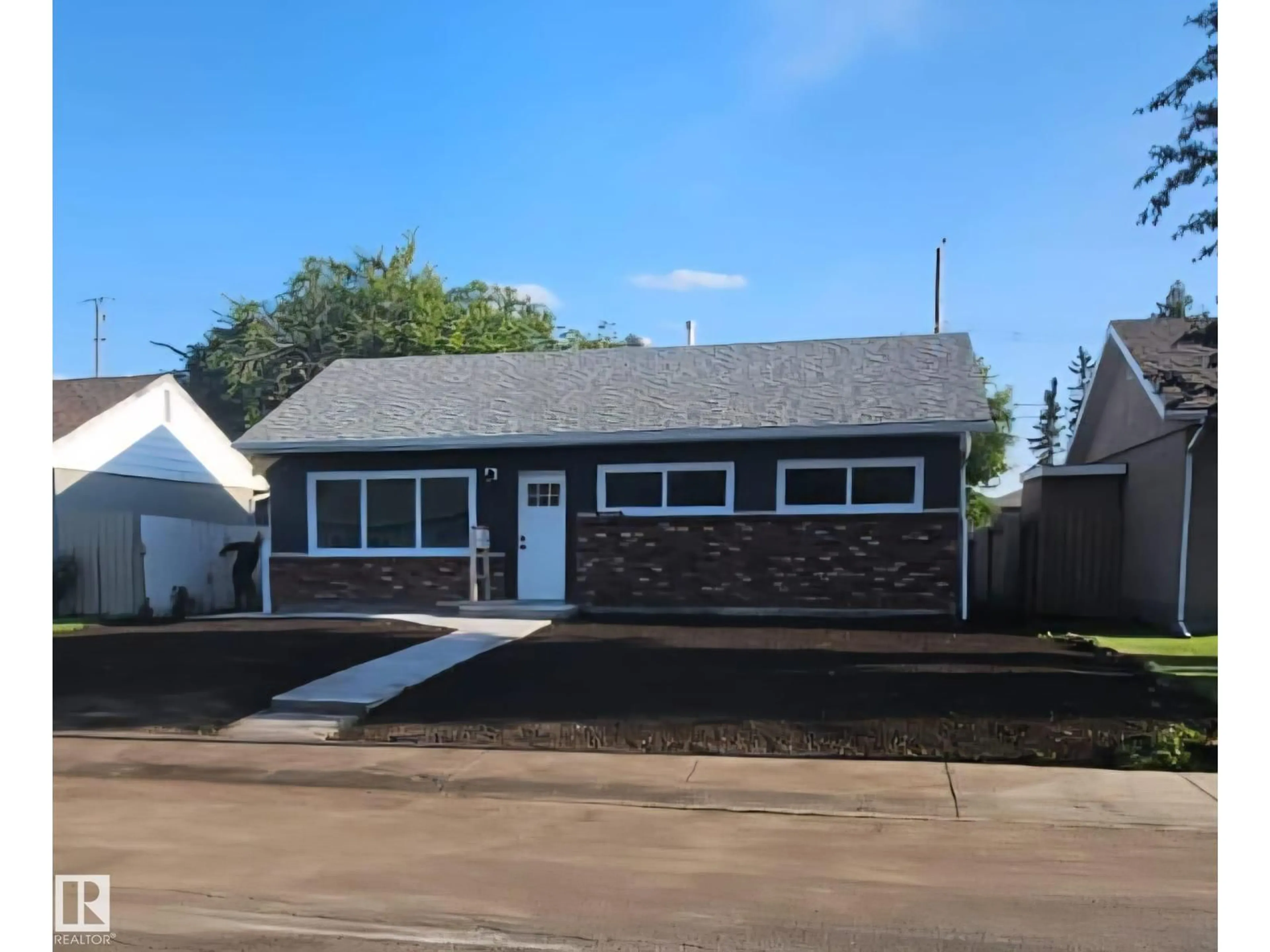Home with vinyl exterior material, street for 15911 108 AV, Edmonton Alberta T5P1A8