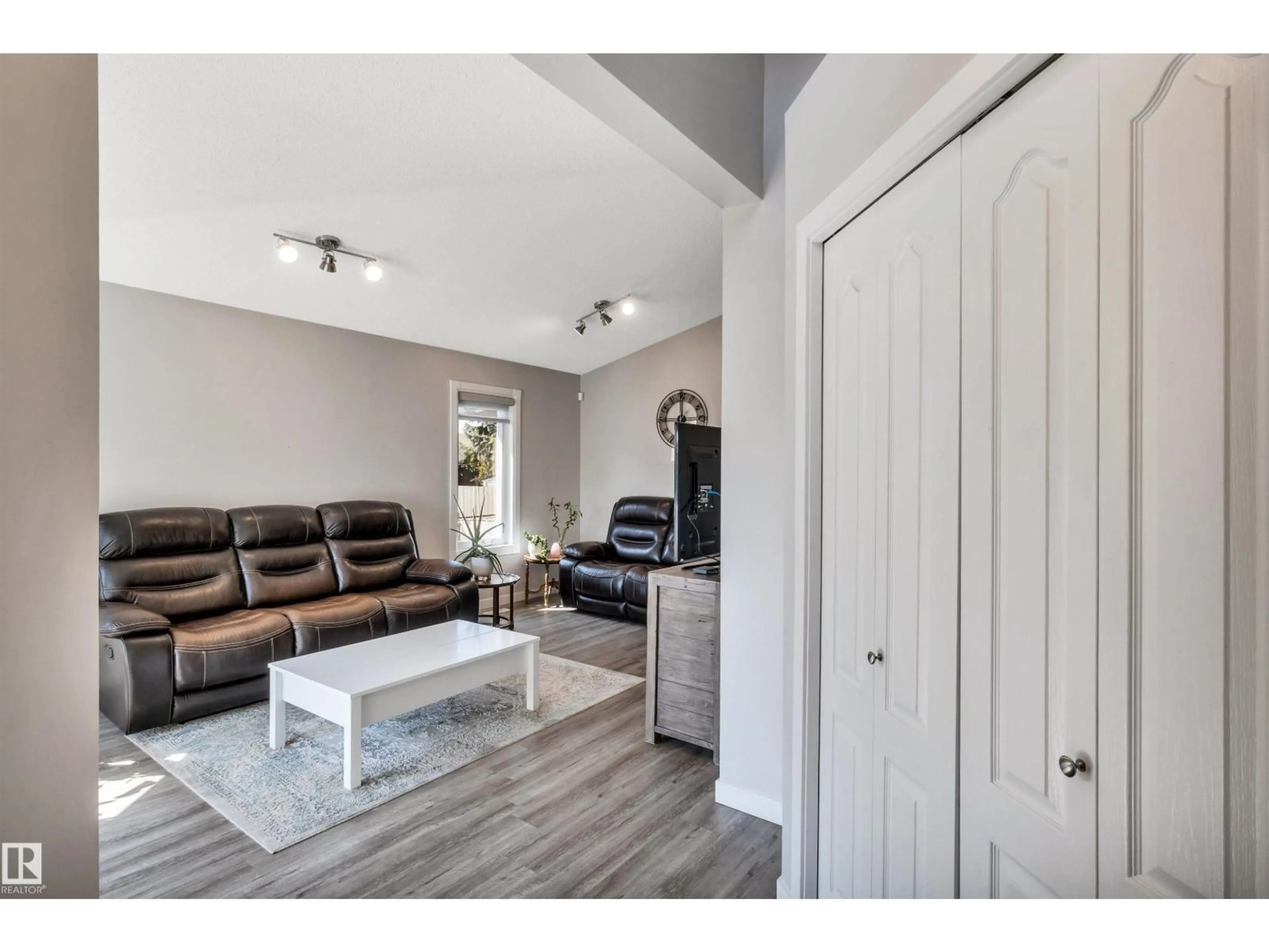Living room with furniture, wood/laminate floor for 78 DEER PARK BV, Spruce Grove Alberta T7X3K2