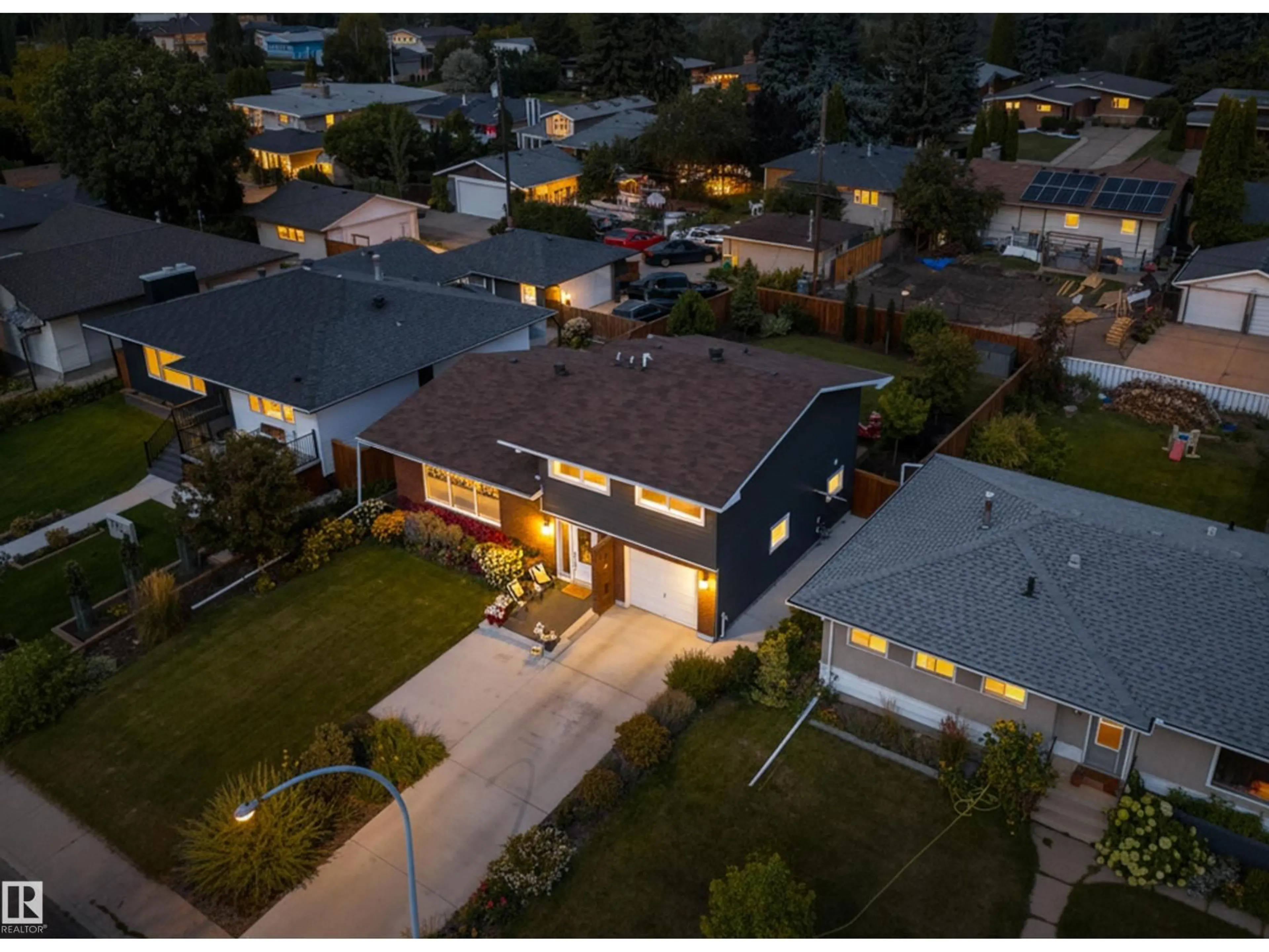 A pic from outside/outdoor area/front of a property/back of a property/a pic from drone, street for 7708 106A AV, Edmonton Alberta T6A1K6